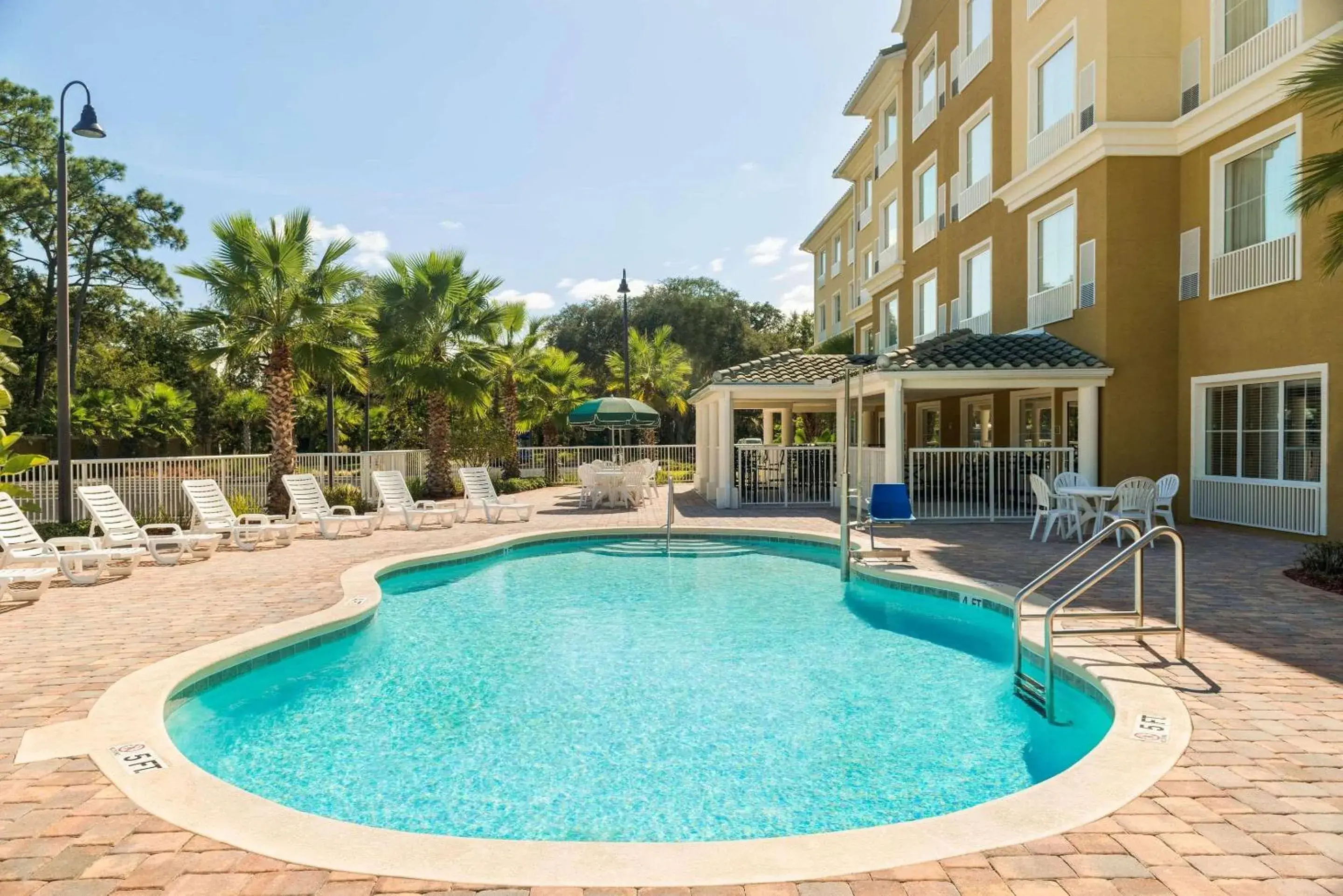 Swimming pool in Country Inn & Suites by Radisson, Port Orange-Daytona, FL Swimming pool in Country Inn & Suites by Radisson, Port Orange-Daytona, FL