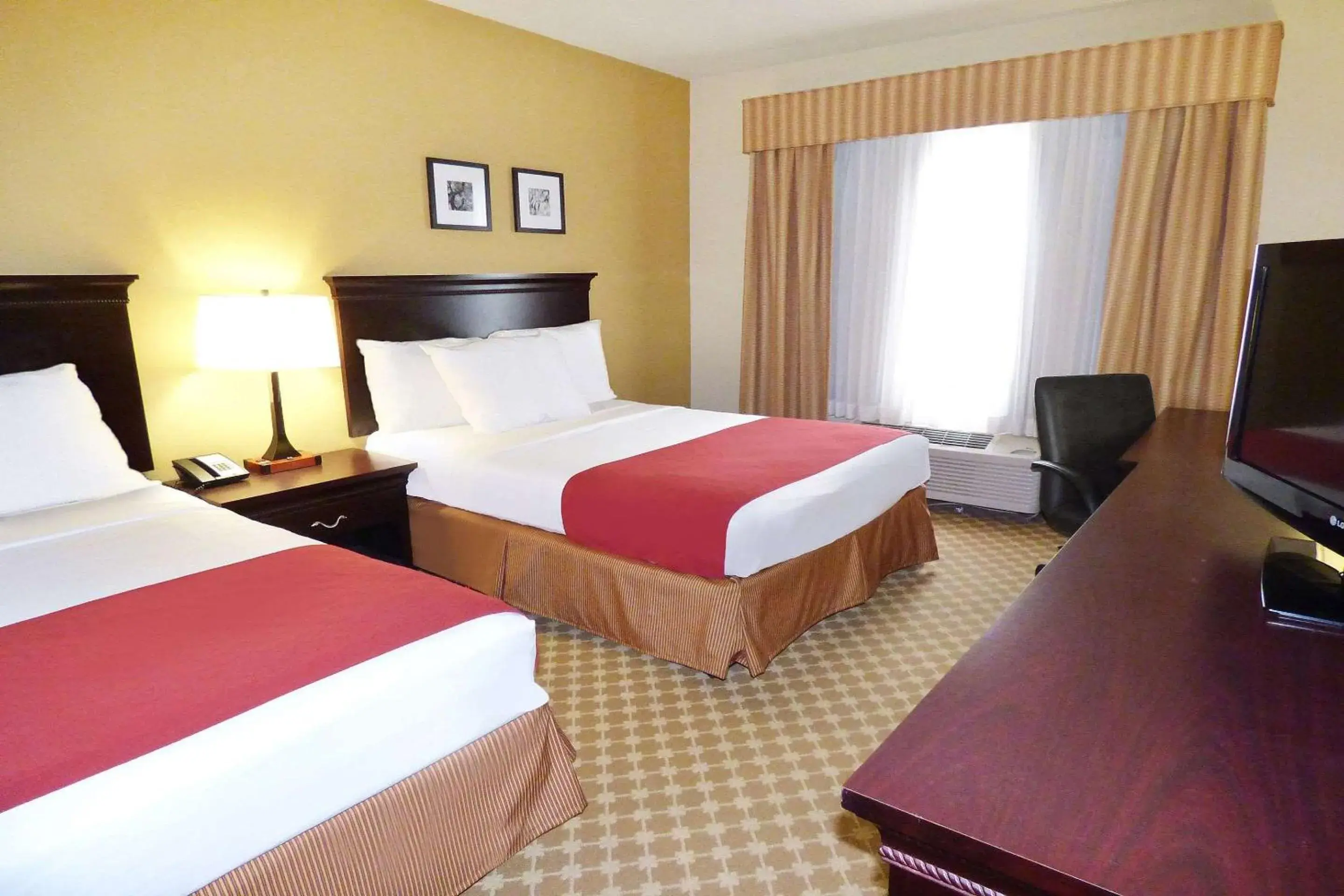 Bedroom, Bed in Country Inn & Suites by Radisson, Port Orange-Daytona, FL Bedroom, Bed in Country Inn & Suites by Radisson, Port Orange-Daytona, FL