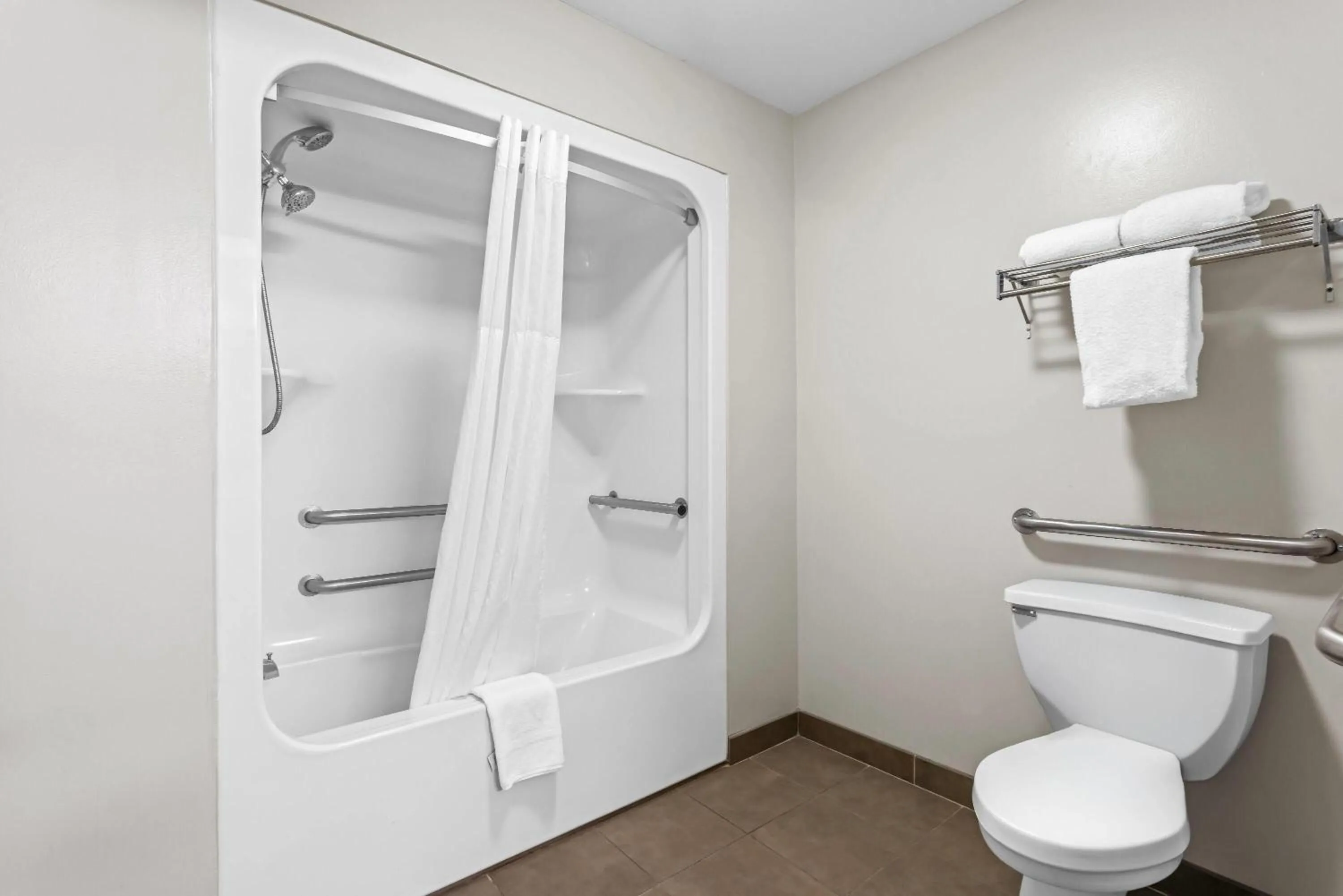 Bathroom in Super 8 by Wyndham Valdosta GA I-75