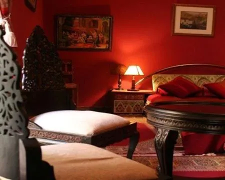 Seating area, Bed in Le Riad Meknes