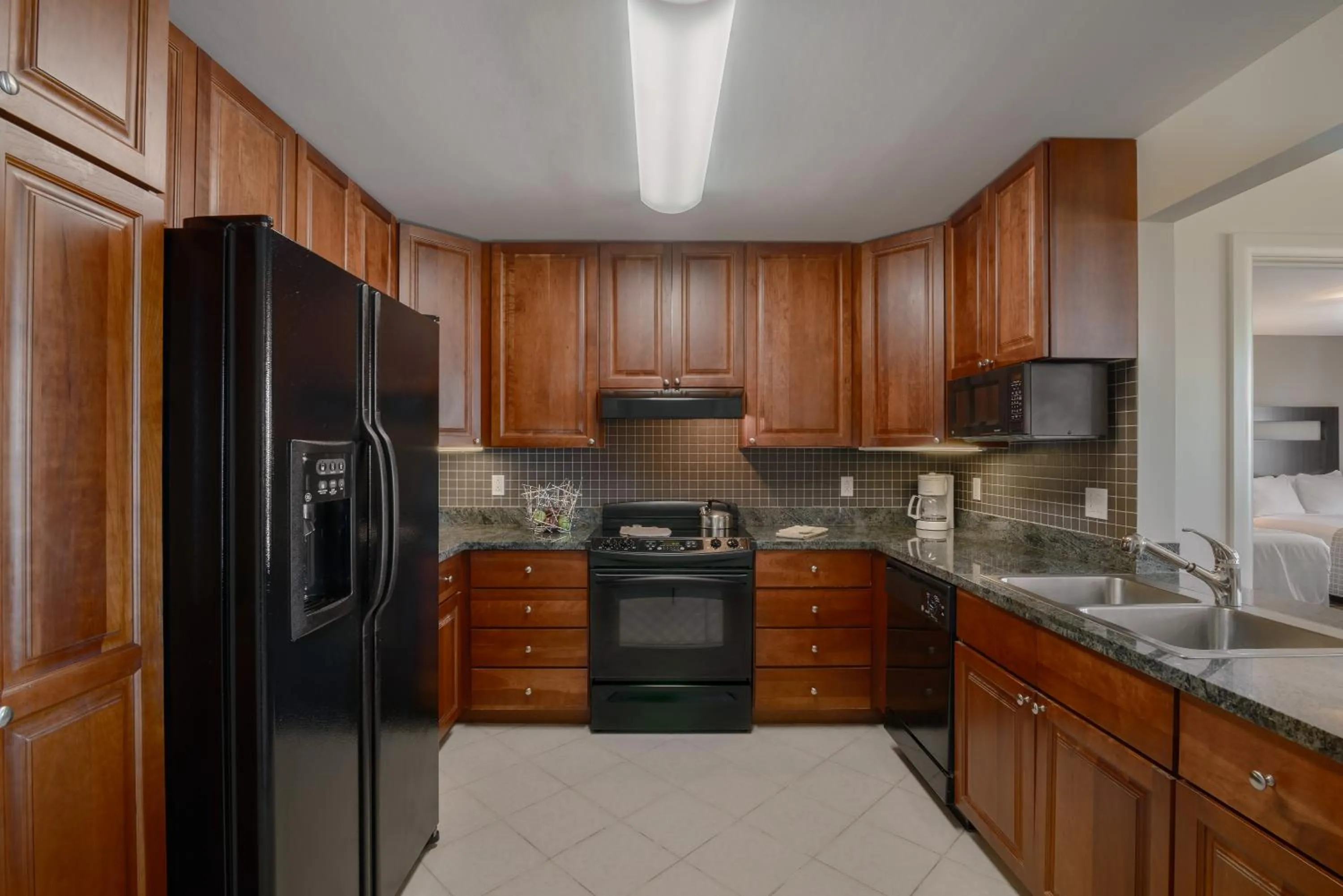 Kitchen or kitchenette in Broadway Plaza, Trademark Collection by Wyndham