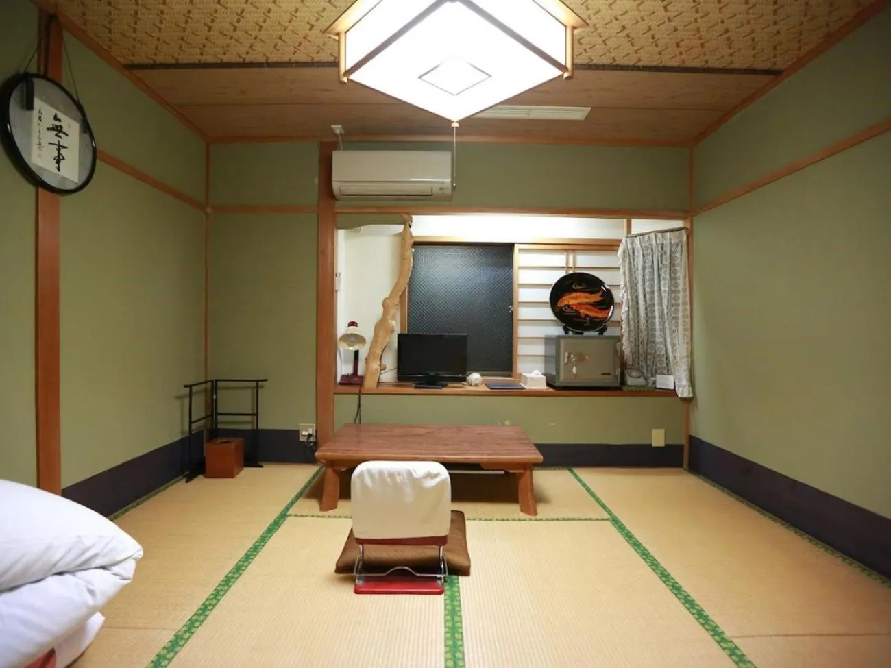 Bed in Takao Kanko Hotel