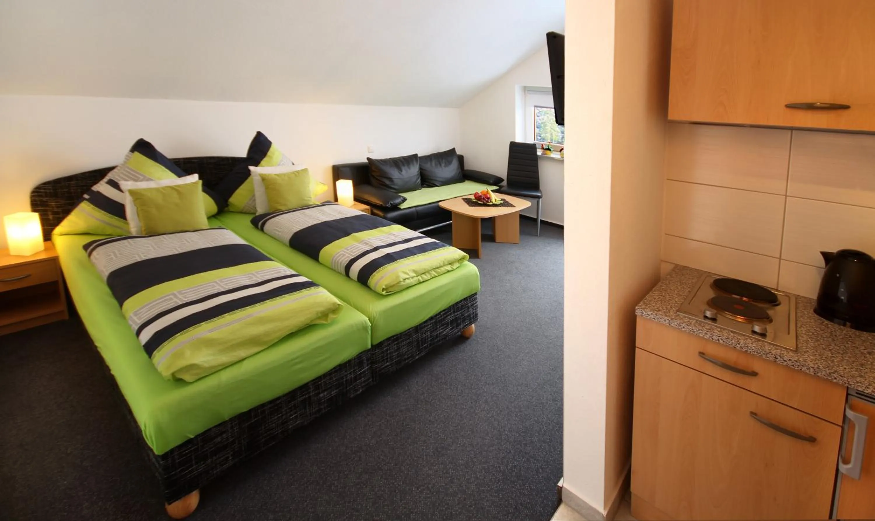 Photo of the whole room, Bed in Appart-Hotel Harmonie