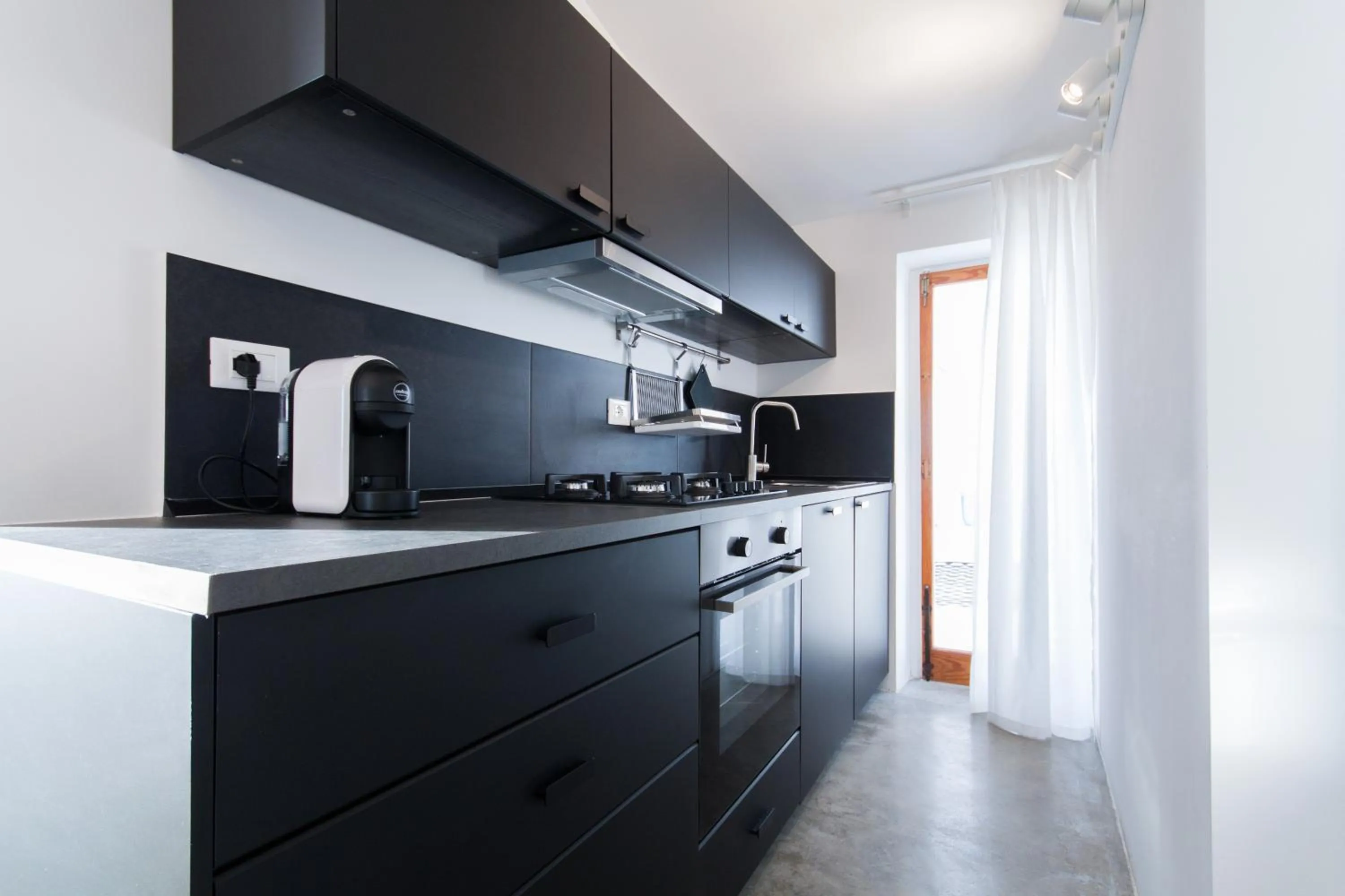 Kitchen or kitchenette in Marina Beach Resort by Le Dhome Sicily
