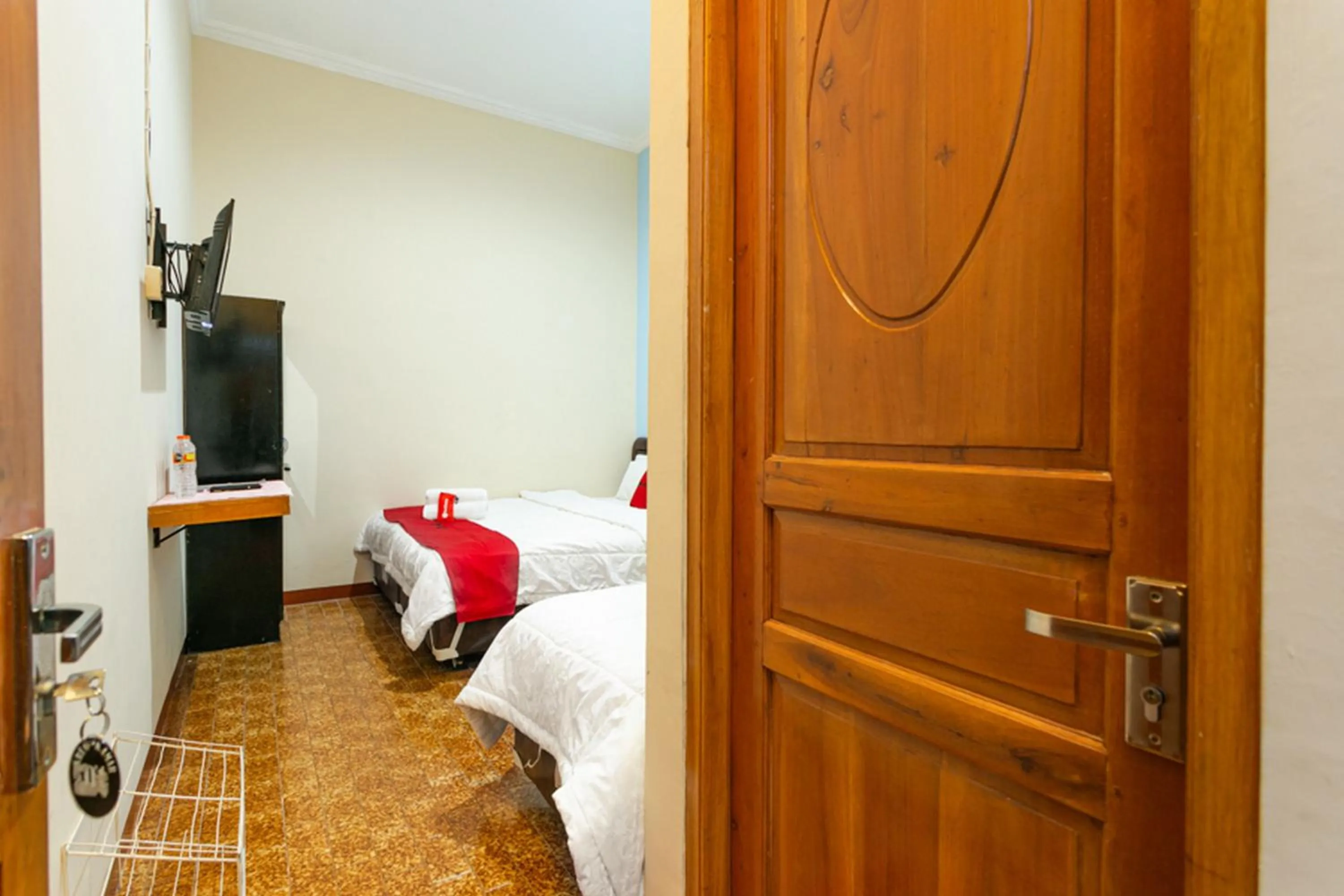 Bed in RedDoorz Syariah @ Sakinah Guesthouse