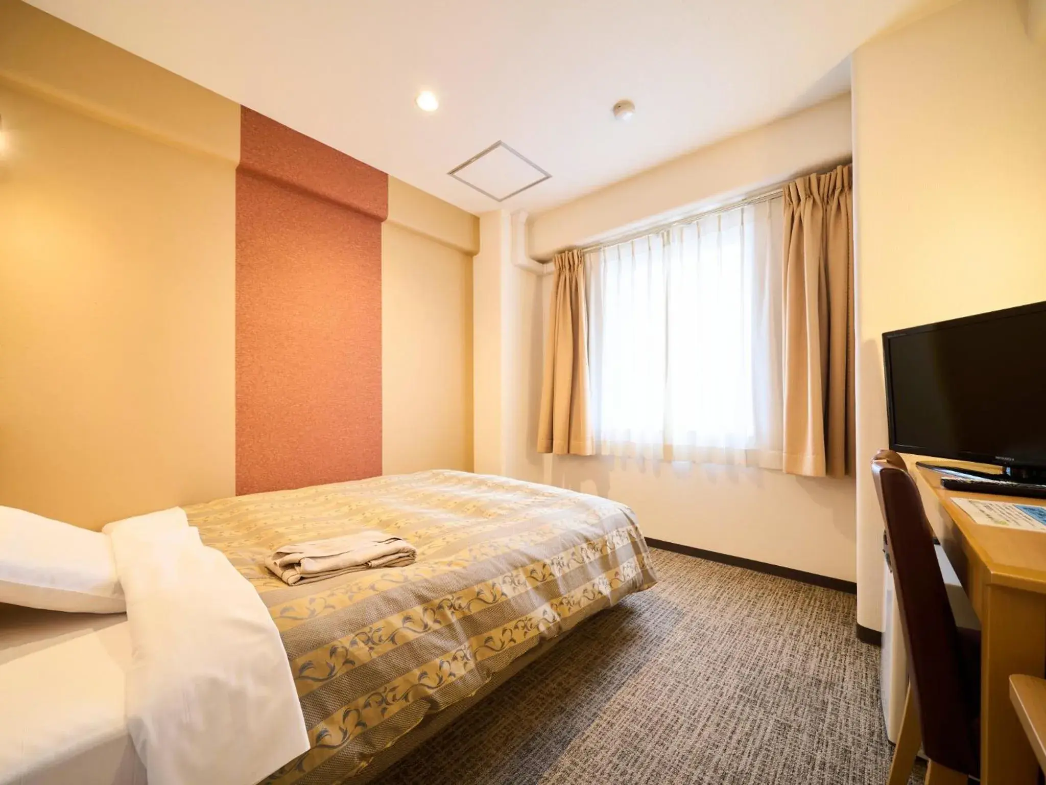 Bed in Kyoto Daiichi Hotel