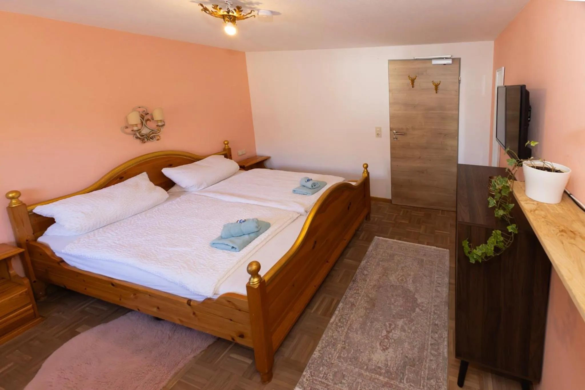 Bed in Goldiger Hirsch B&B mit Gemeinschaftsküche