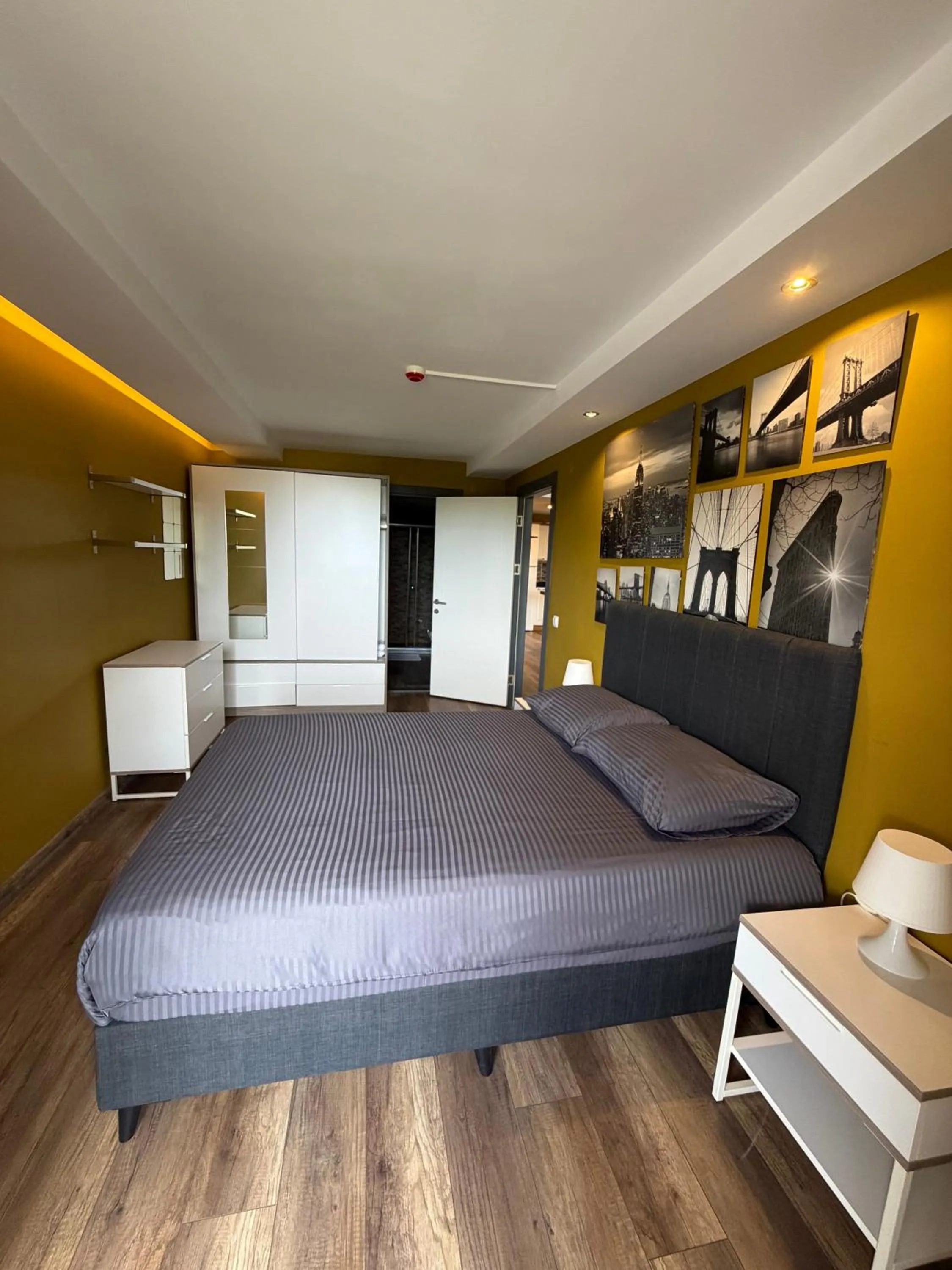 Bed in Deluxe Beach Residence