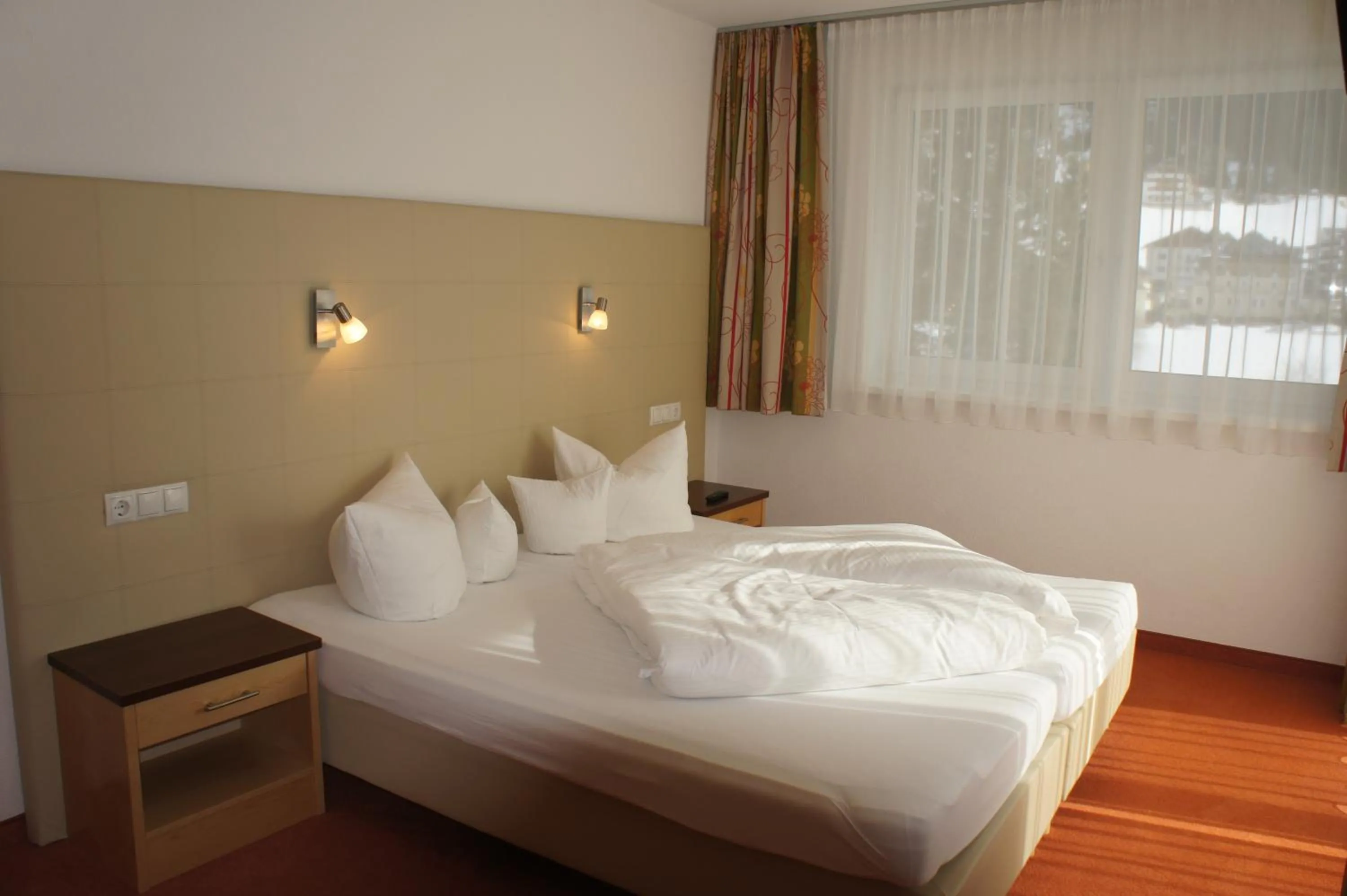 Decorative detail, Bed in alpinea Appartements