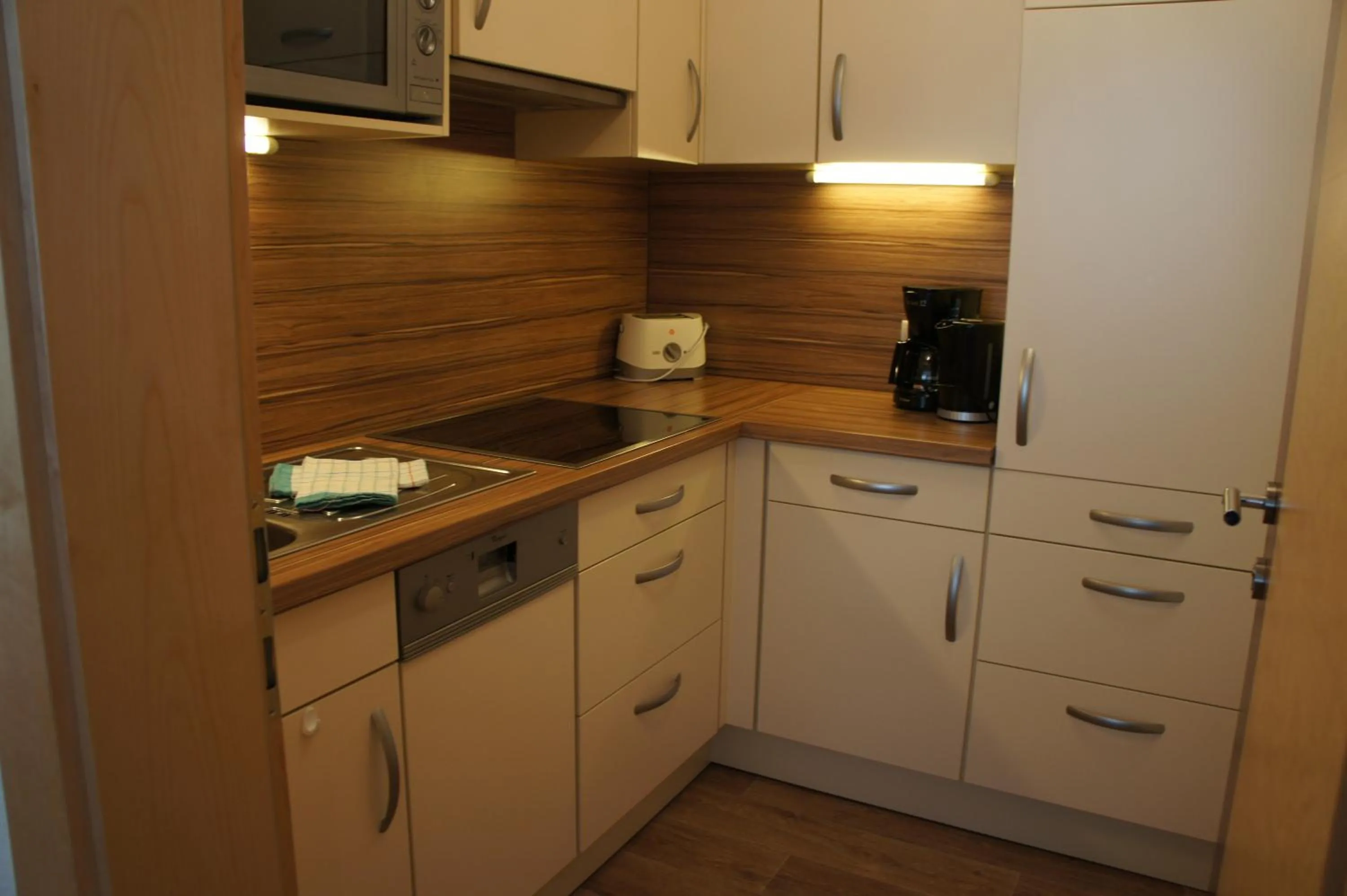Kitchen or kitchenette in alpinea Appartements