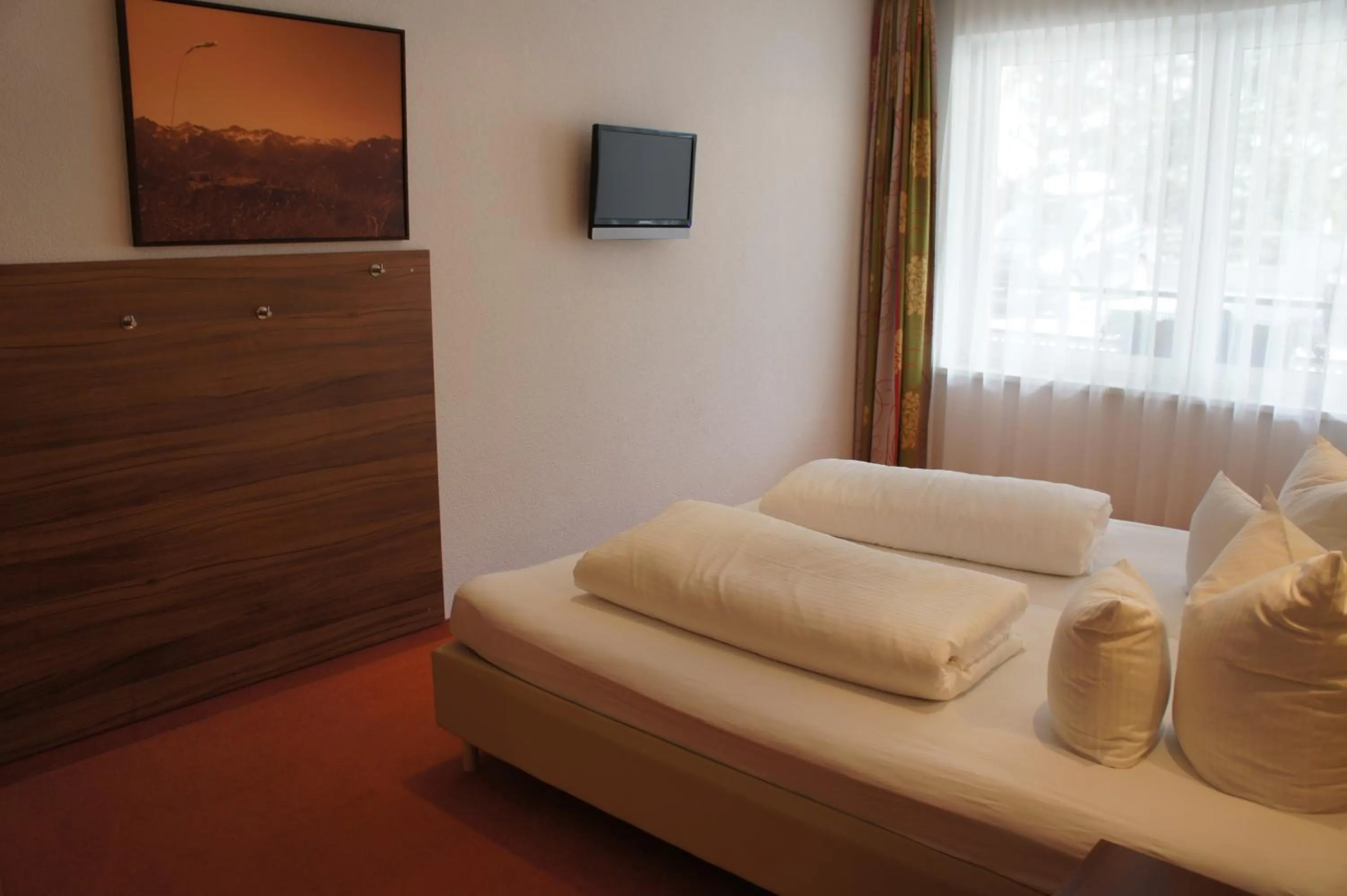 Decorative detail, Bed in alpinea Appartements