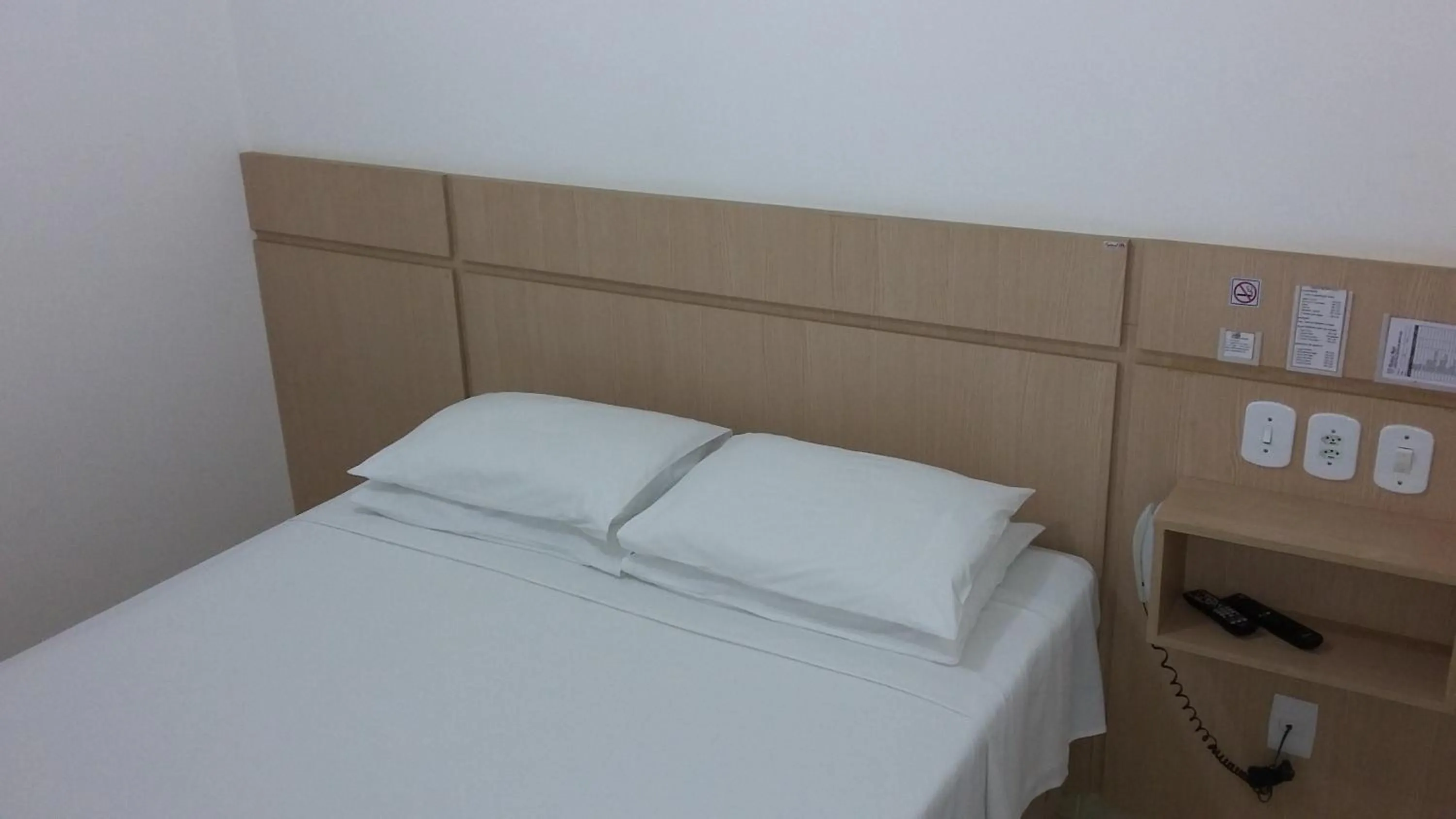 Bed in Richard Hotel