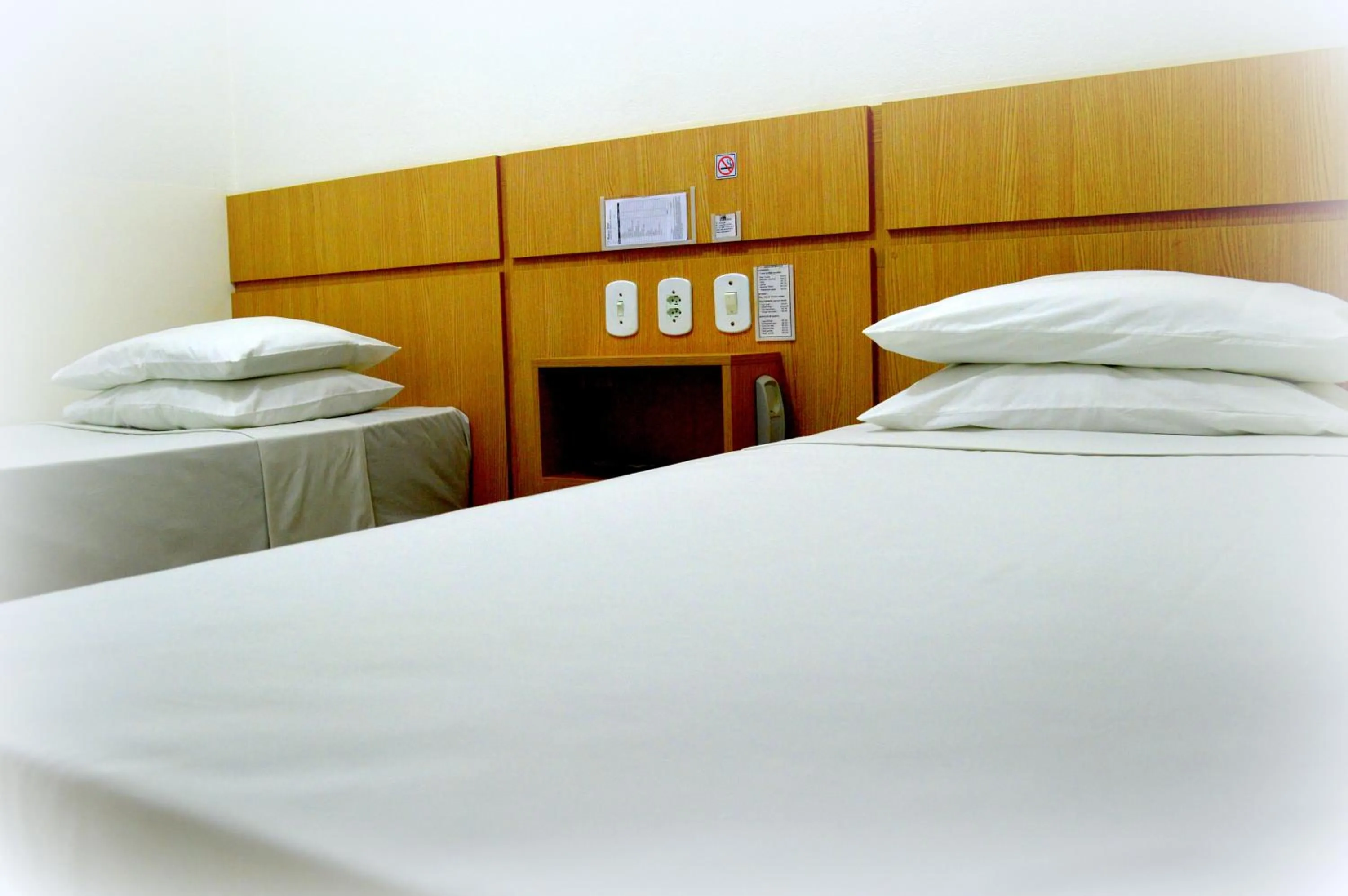 Bed in Richard Hotel