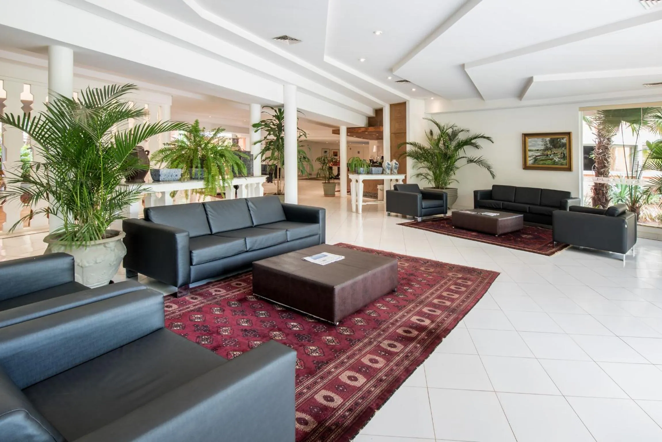 Lobby or reception in Carlton Suítes Limeira