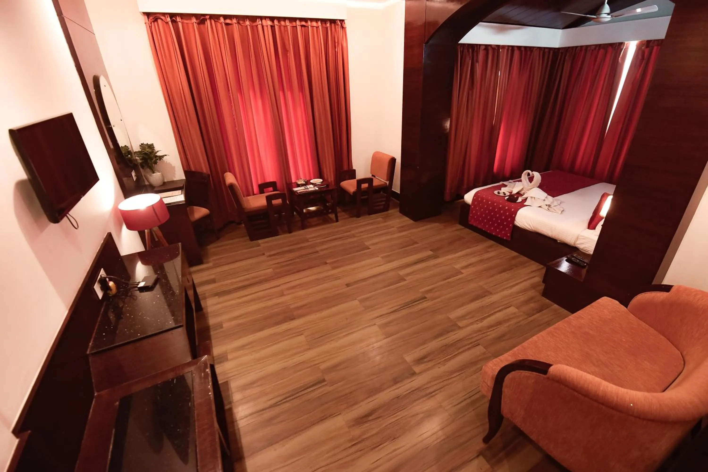 Living room, Bed in Konark Grand Hotel