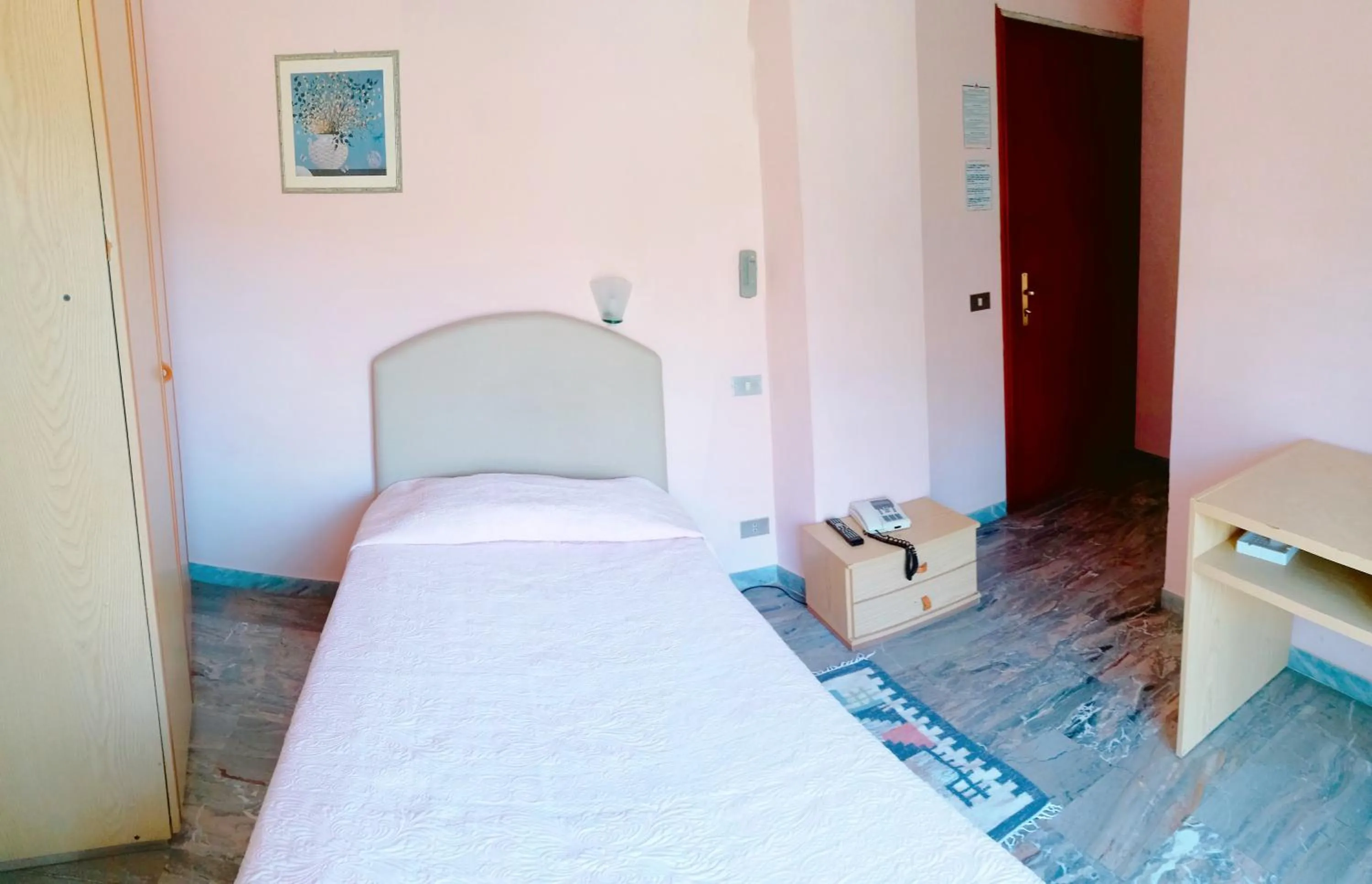 Bed in PARADISO Hotel Ristorante