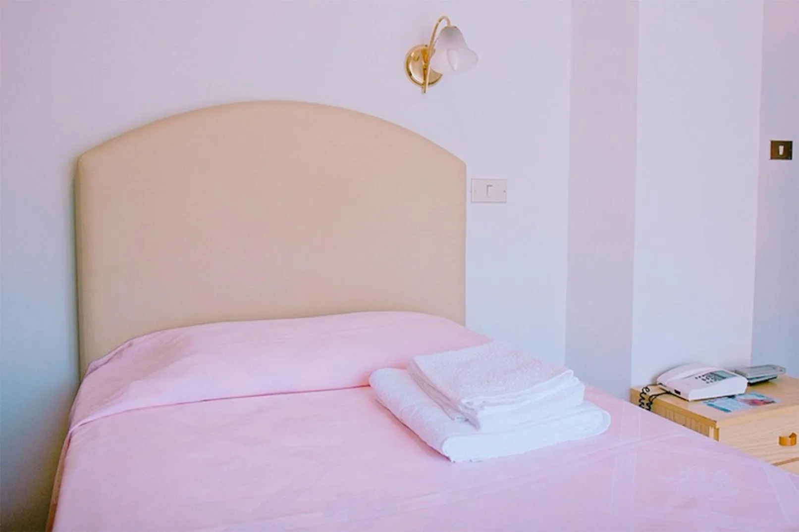 Bed in PARADISO Hotel Ristorante