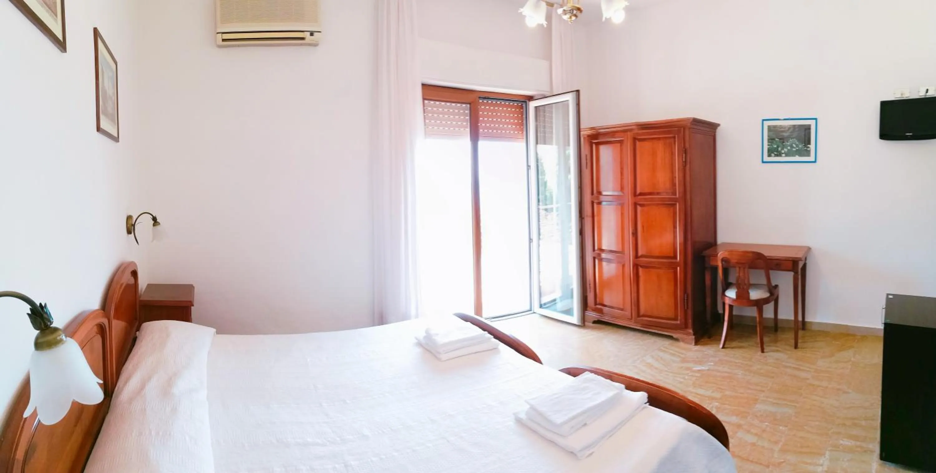 Bed in PARADISO Hotel Ristorante