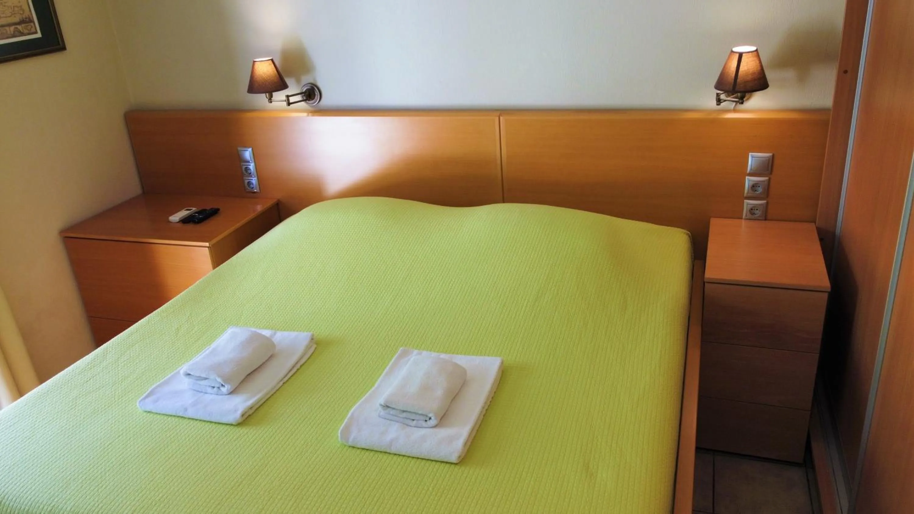 Bed in Villiana Holiday Apartments