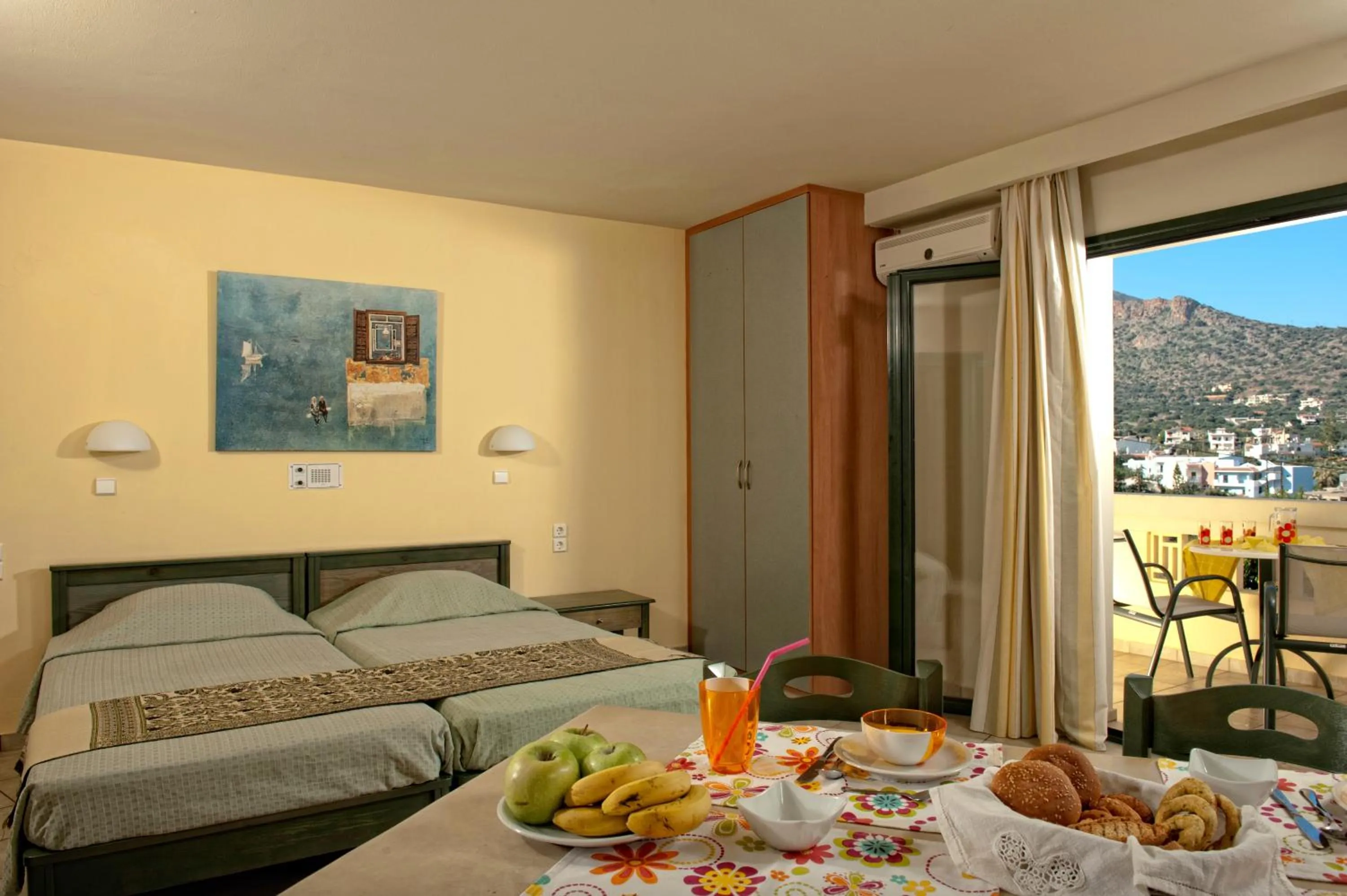 Bed in Villiana Holiday Apartments