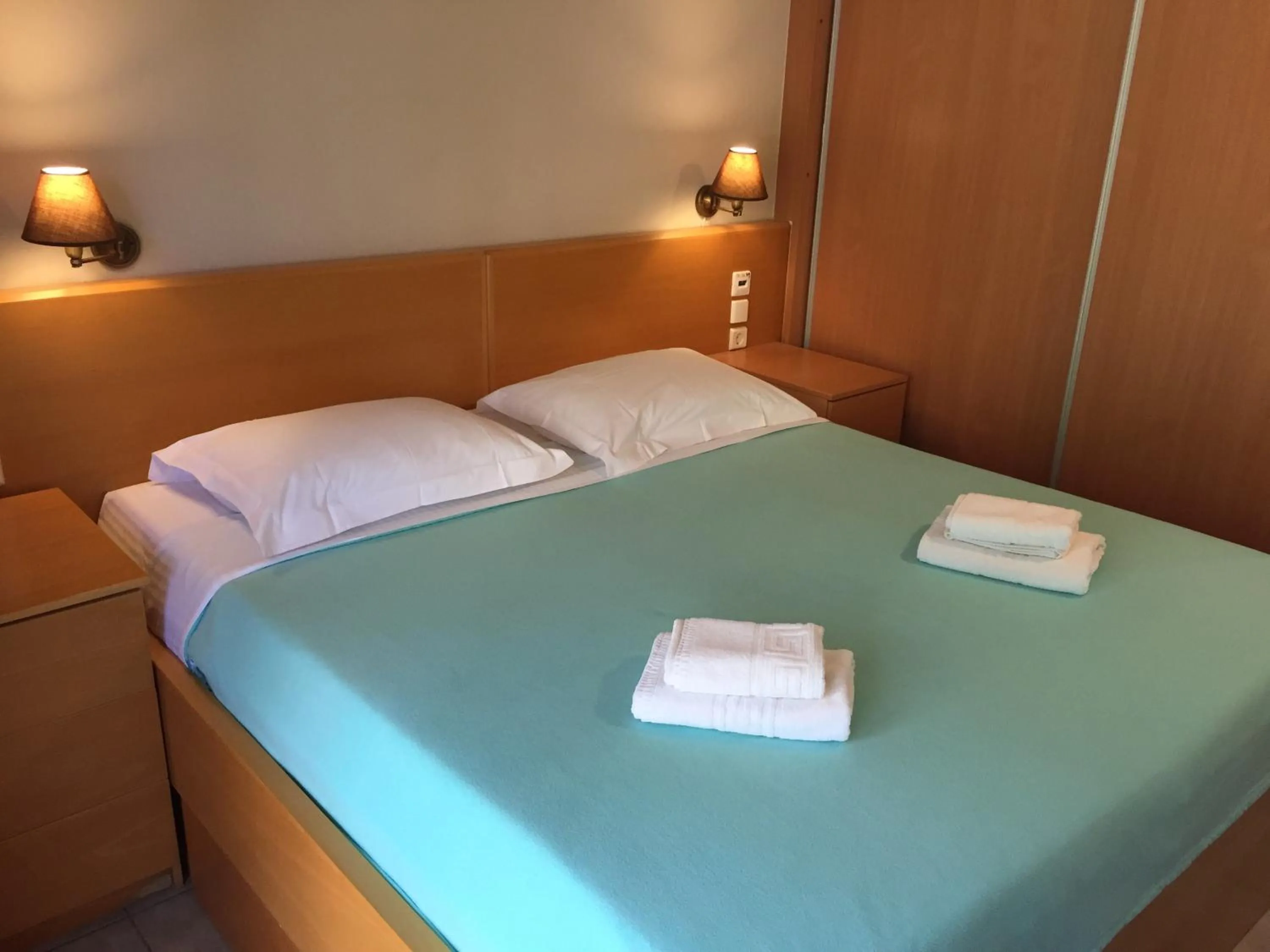 Bed in Villiana Holiday Apartments