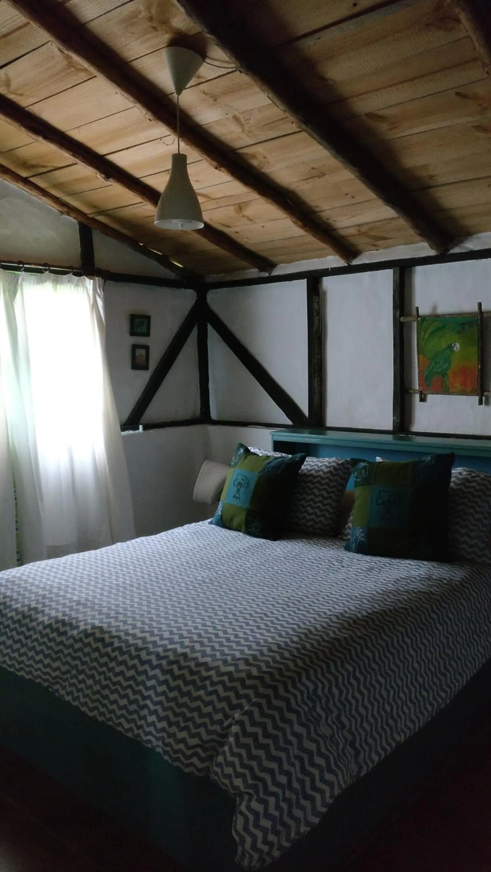 Bed in Villa Pajon Eco Lodge