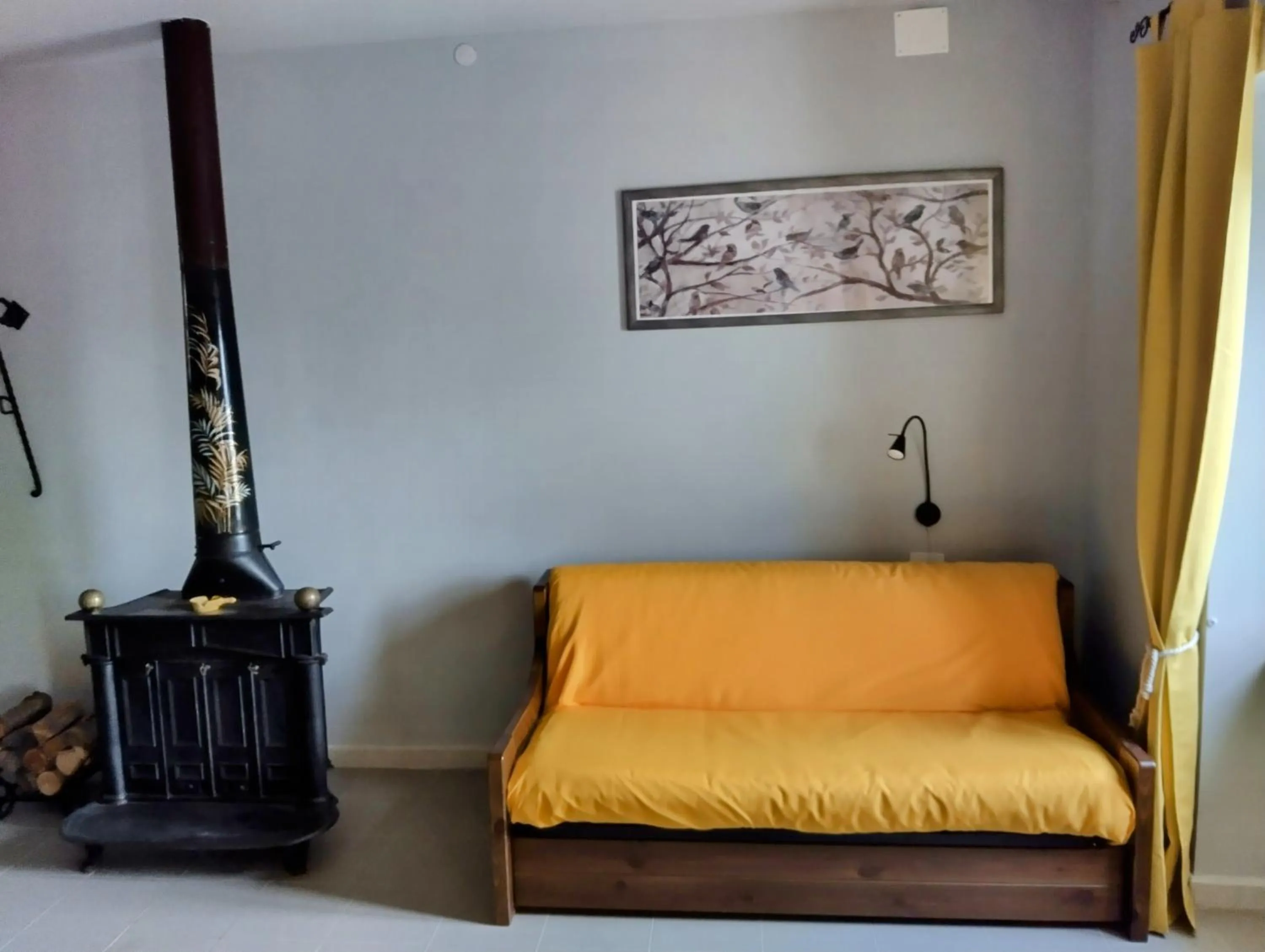 Communal lounge/ TV room in B&B Il Caùto