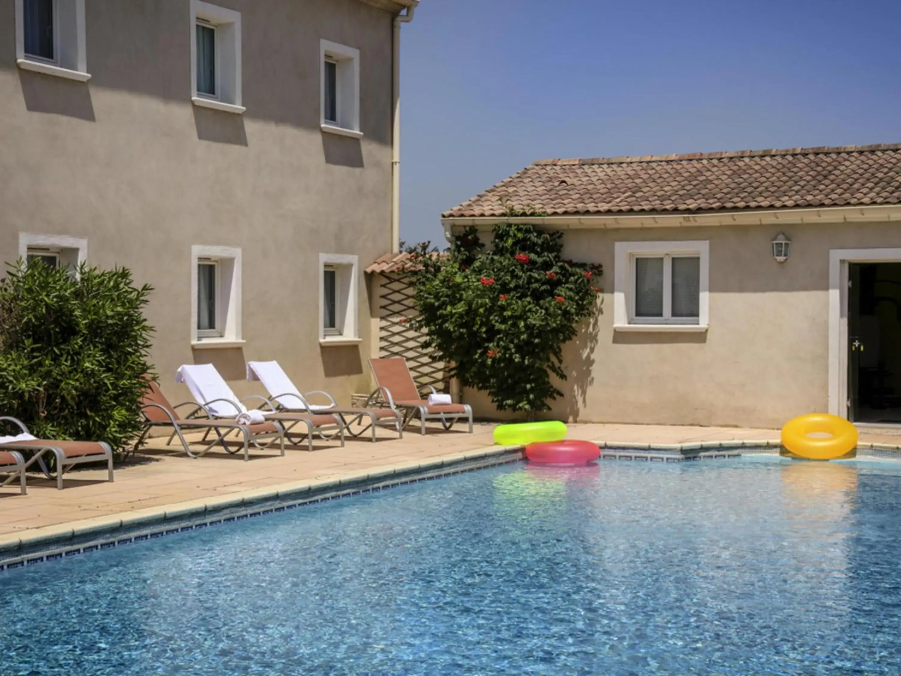 Pool view in ibis Orange Sud Pool view in ibis Orange Sud