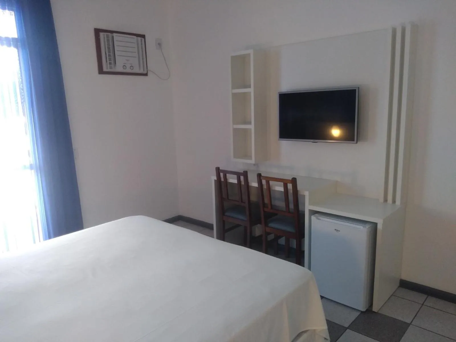 Photo of the whole room, Bed in Joaquina Beach Hotel