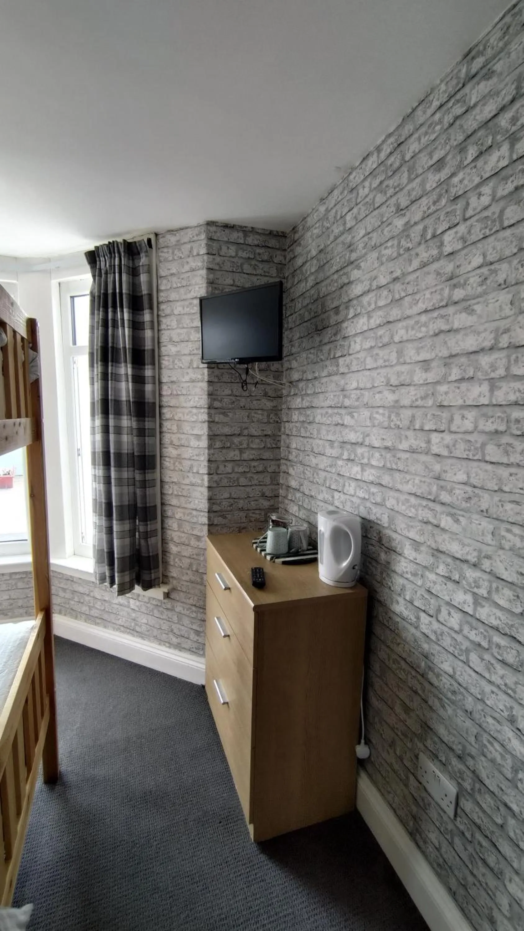 Bedroom in OYO Shore Surf Lodge