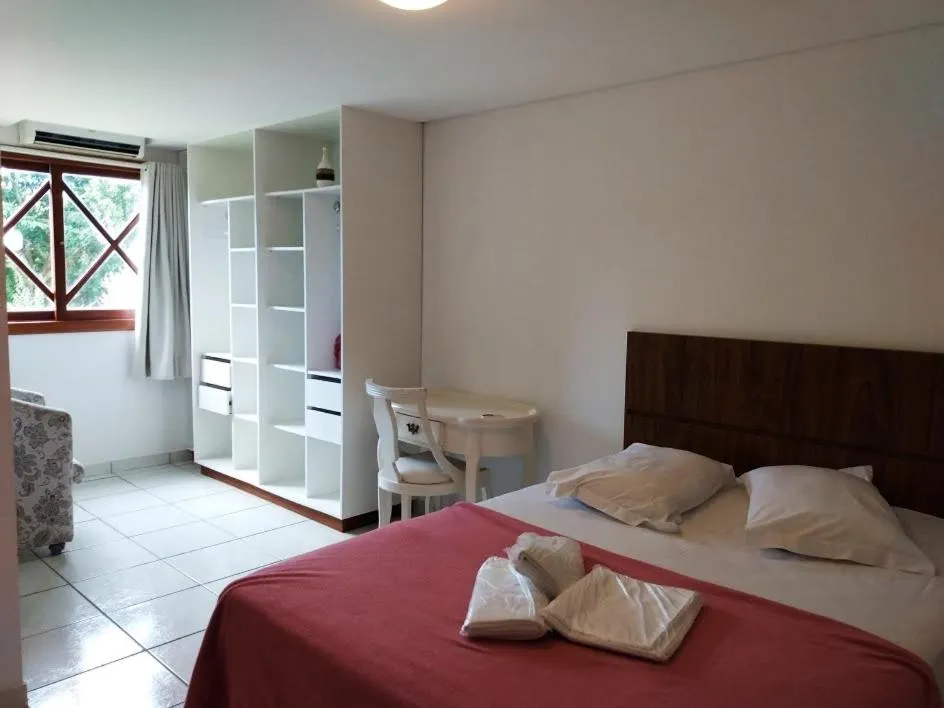 Bed in Pousada Chácara Rio Jordão