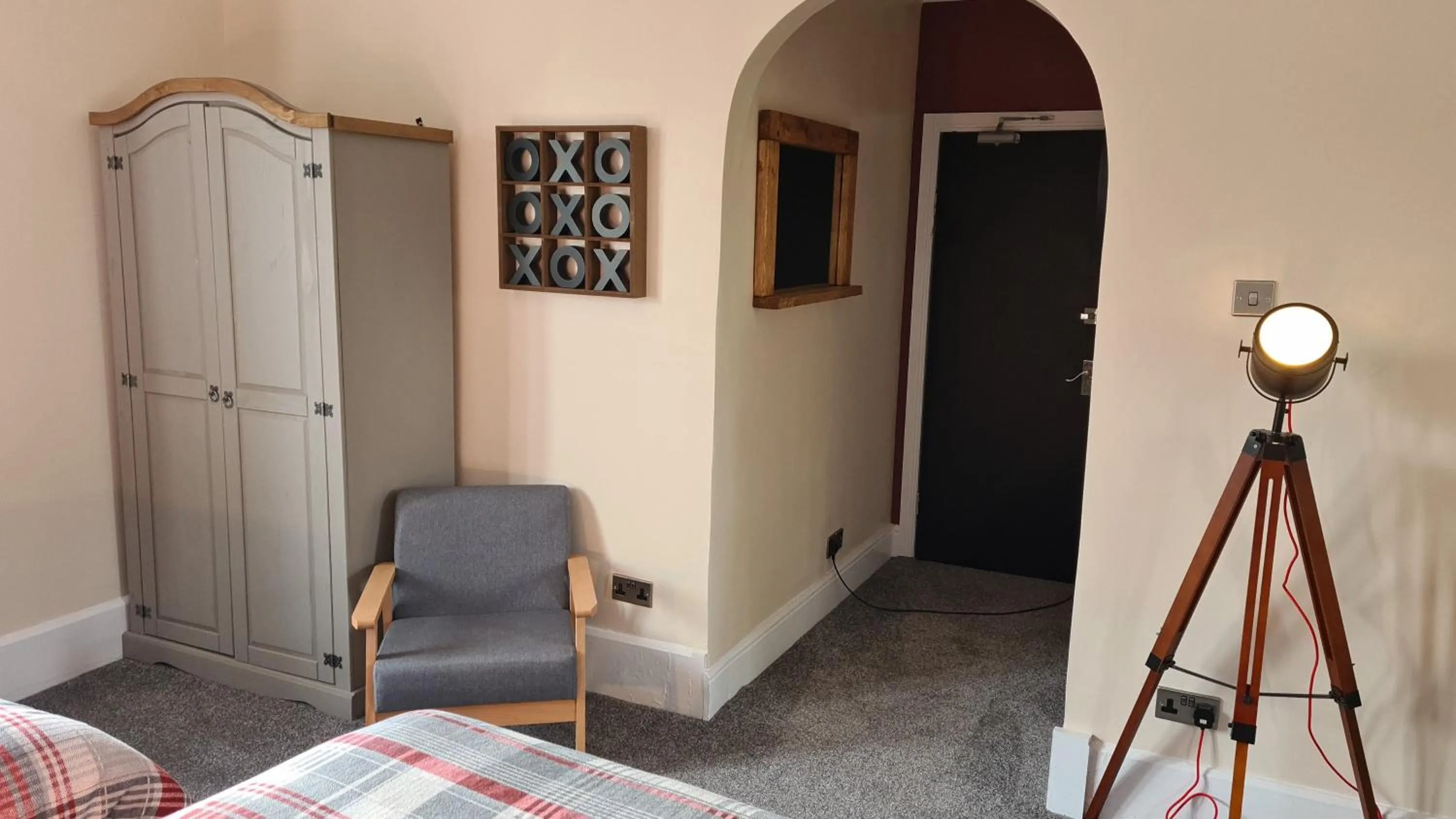 Bed in Tudor Lodge Hotel