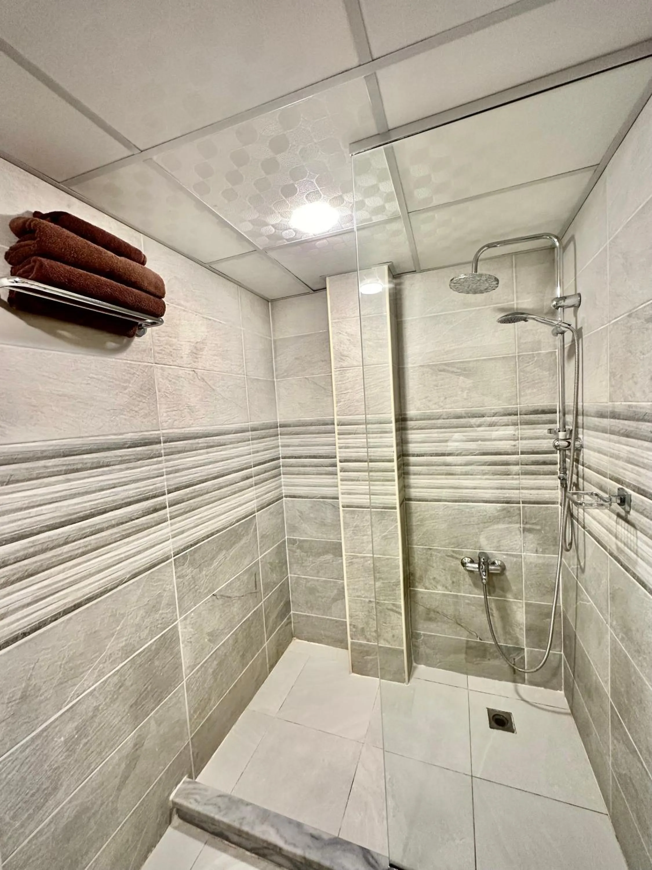 Shower in Anbat Midtown Hotel