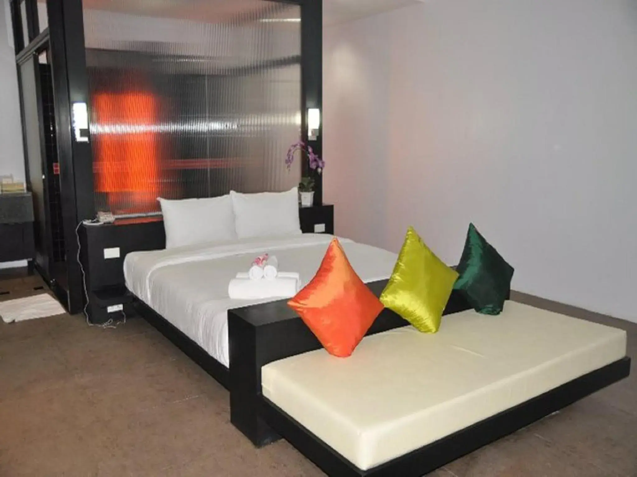 Bed in Khun Chaweng Resort Bed in Khun Chaweng Resort