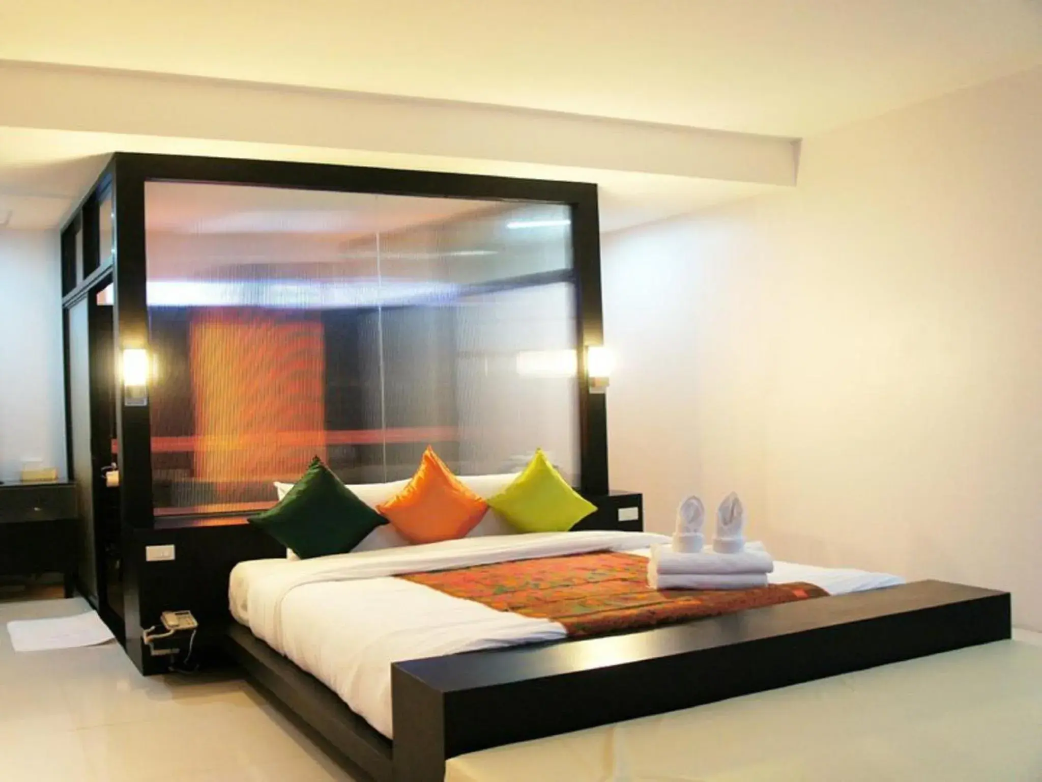 Bed in Khun Chaweng Resort Bed in Khun Chaweng Resort