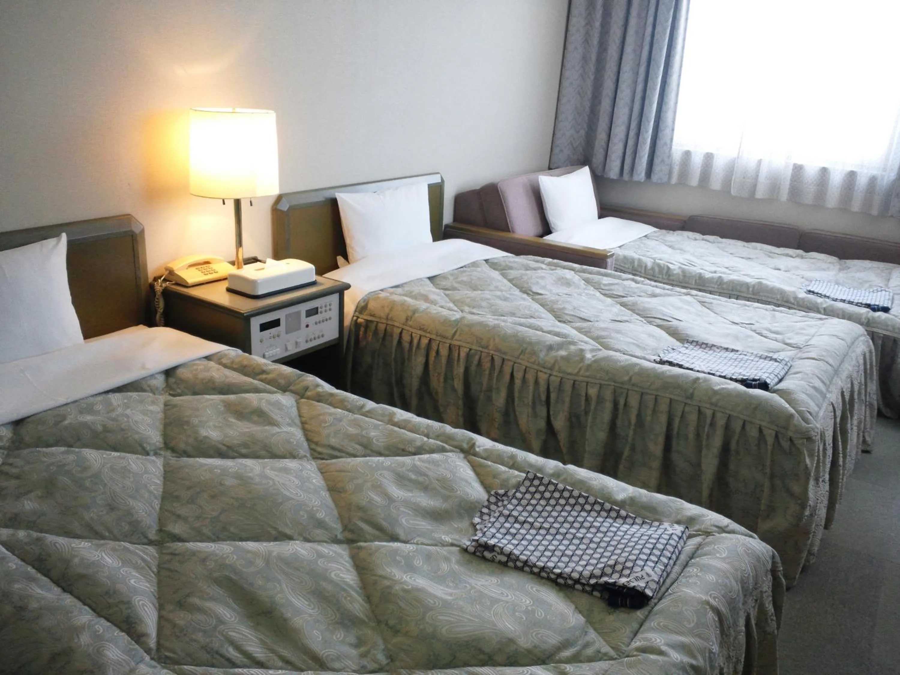 Bed in Pulses Inn Kyoto