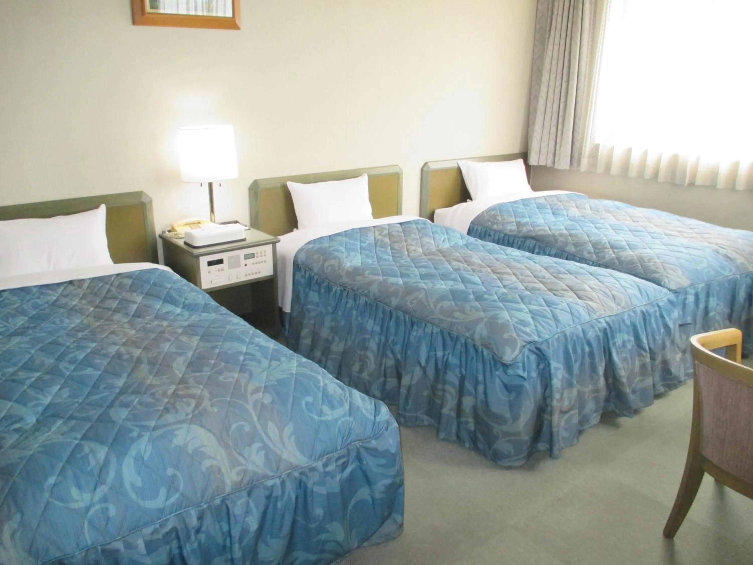 Bed in Pulses Inn Kyoto