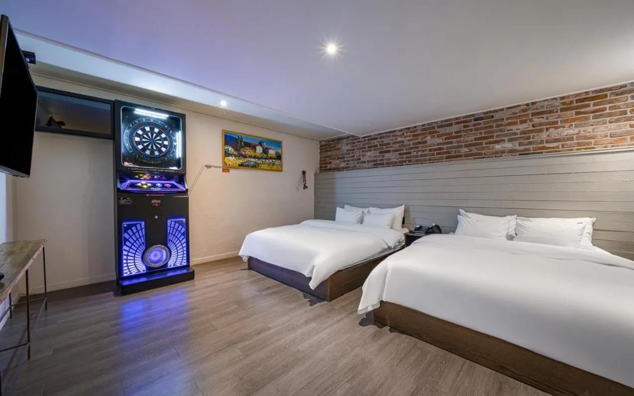 Bed in HOTEL YaJa WestGate