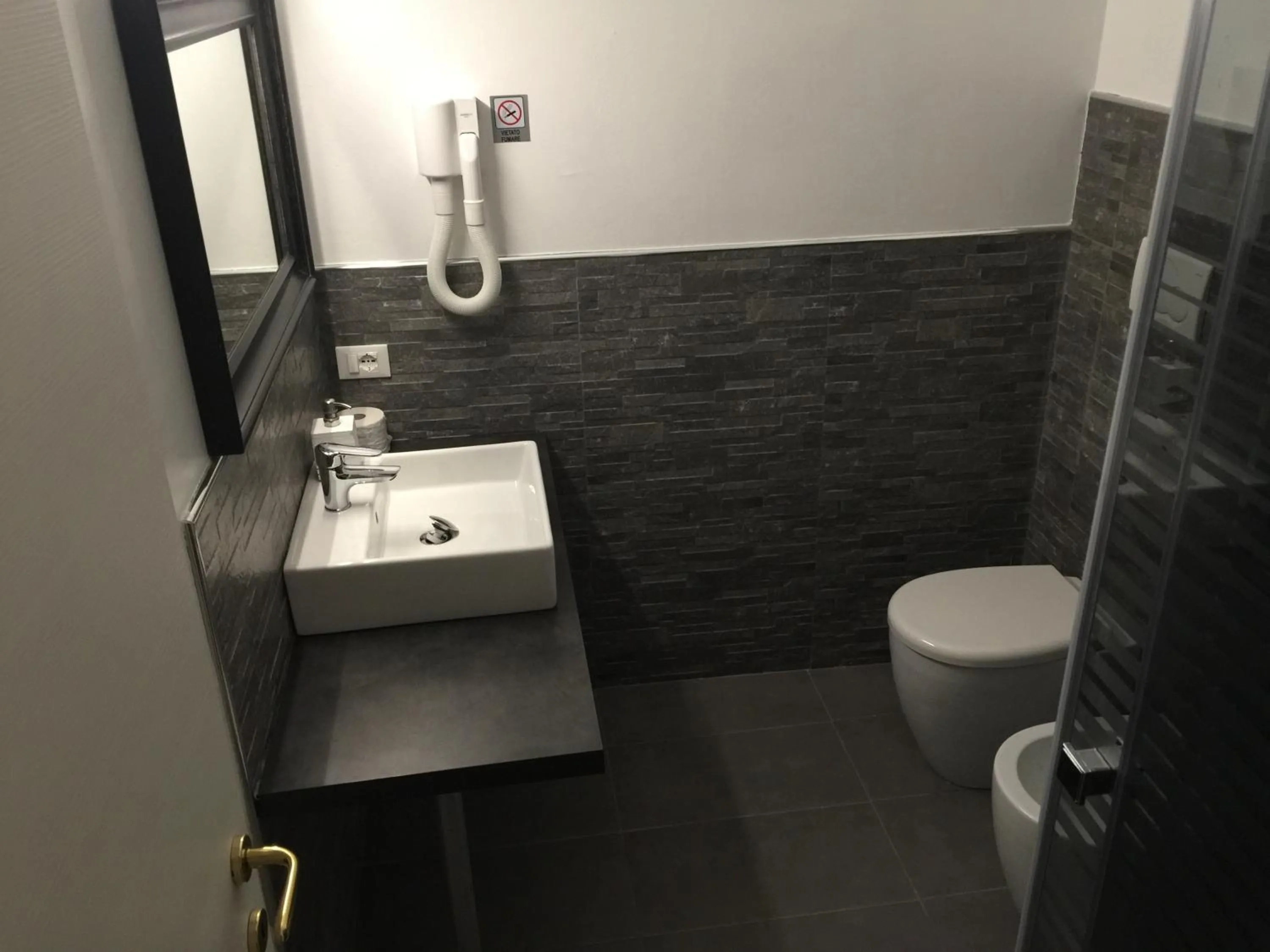 Bathroom in Rigoletto Rental Rooms