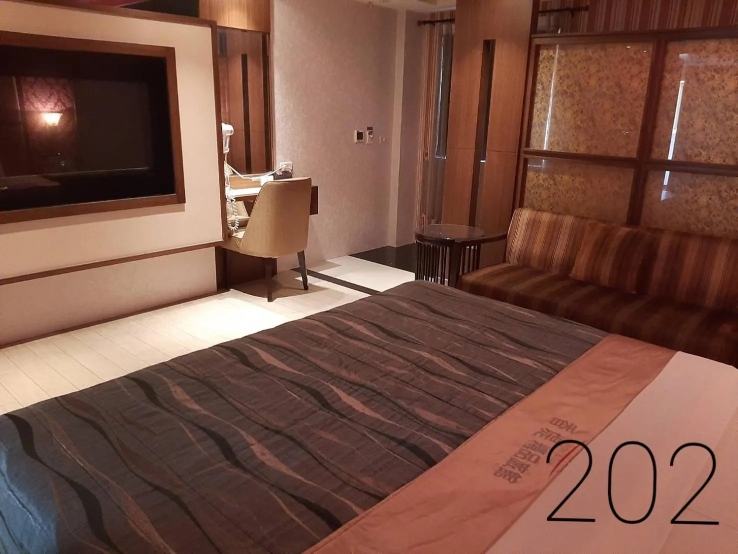 Bed in Chateau Motel & Spa (Daliao)