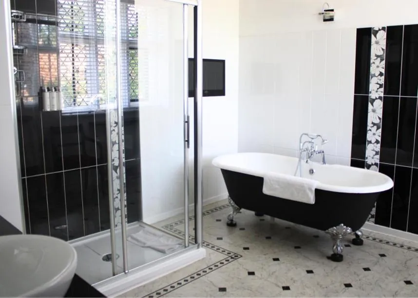 Bathroom in Seckford Hall Hotel & Spa