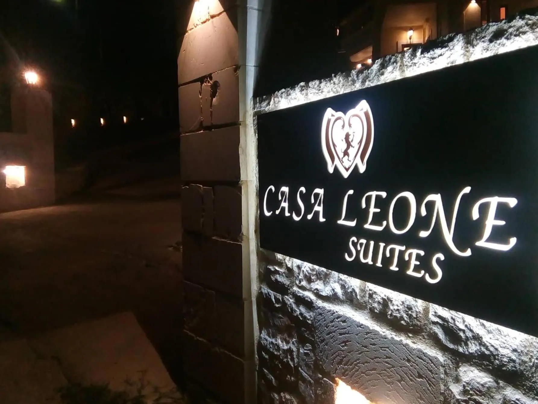 Property logo or sign in Casa Leone Suites