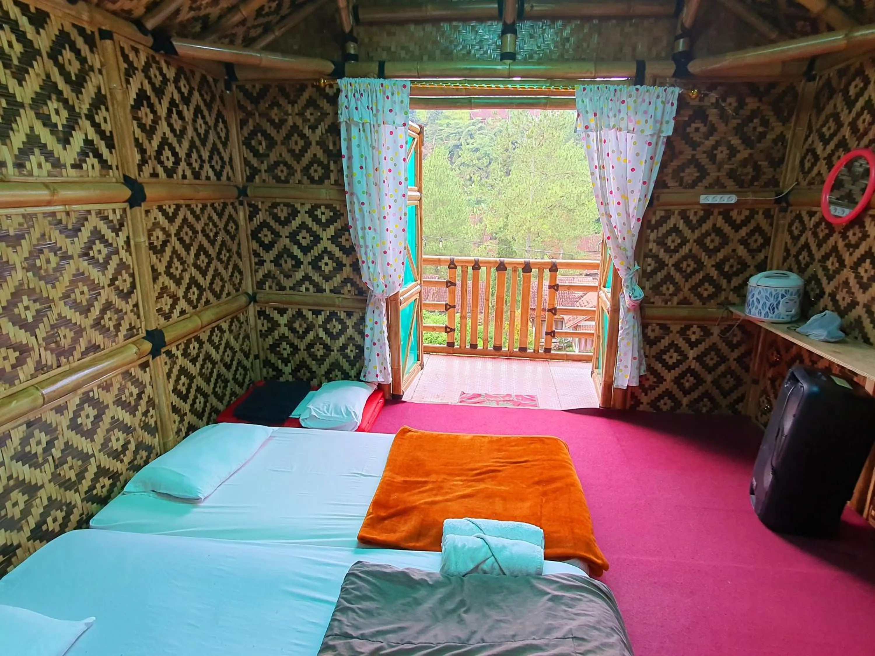 Bed in Ciwidey Jungle Camp & Villa