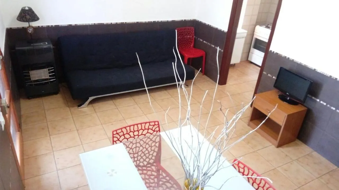 Living room in Stanza in Villa con giardino vista mare