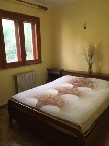 Bedroom, Bed in Stanza in Villa con giardino vista mare