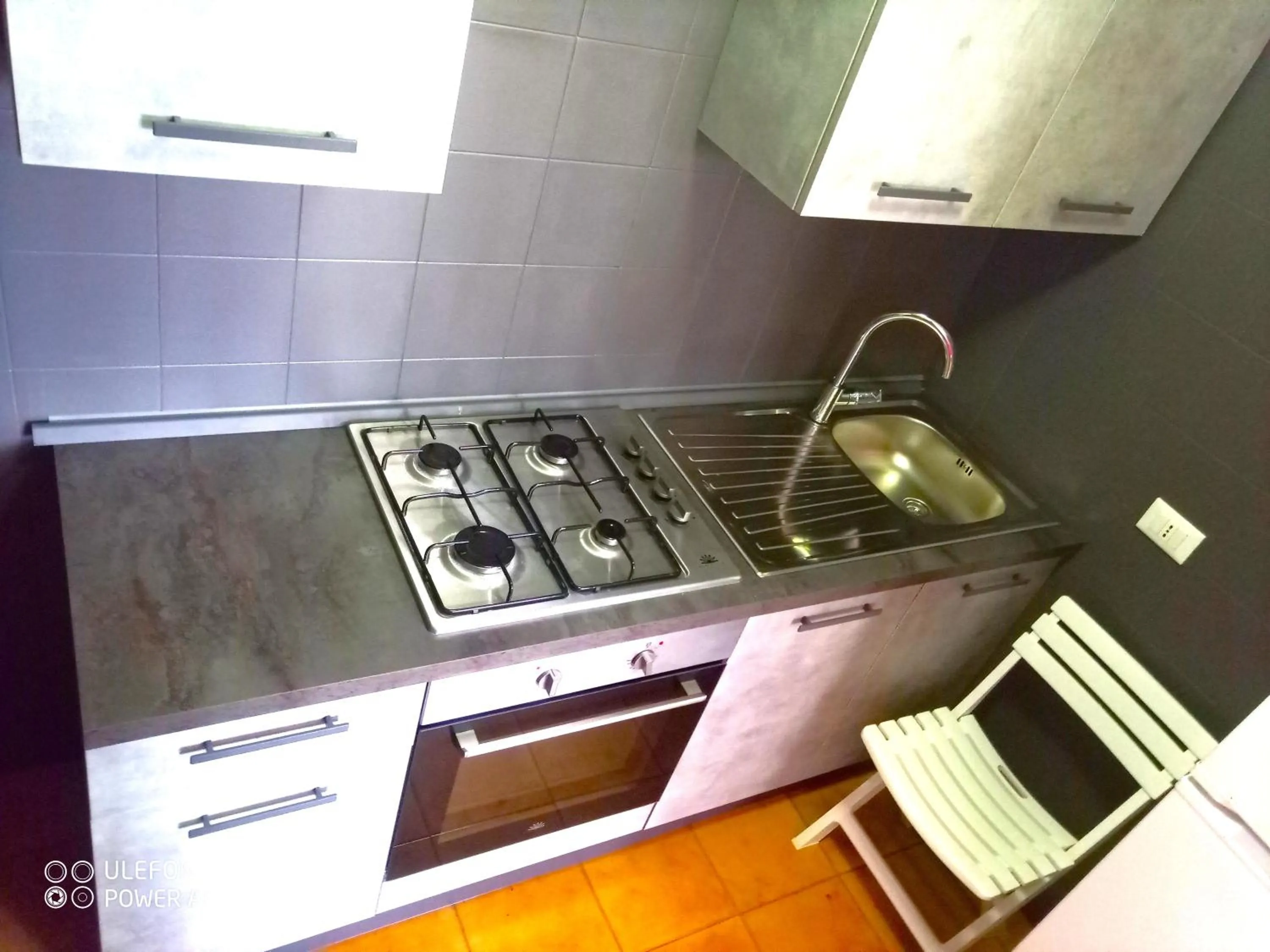 Communal kitchen in Stanza in Villa con giardino vista mare