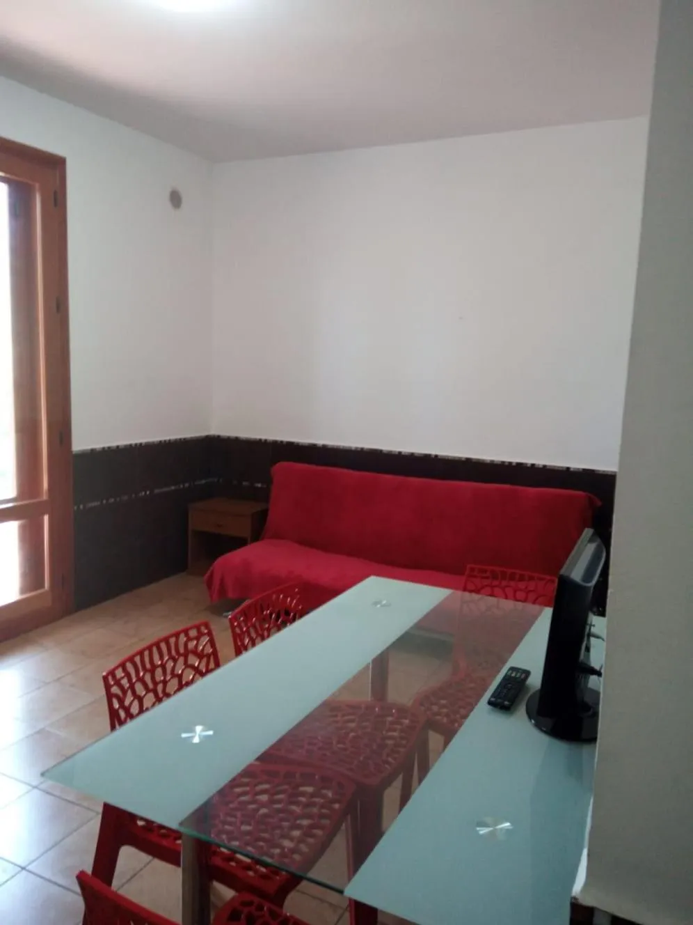 Living room in Stanza in Villa con giardino vista mare