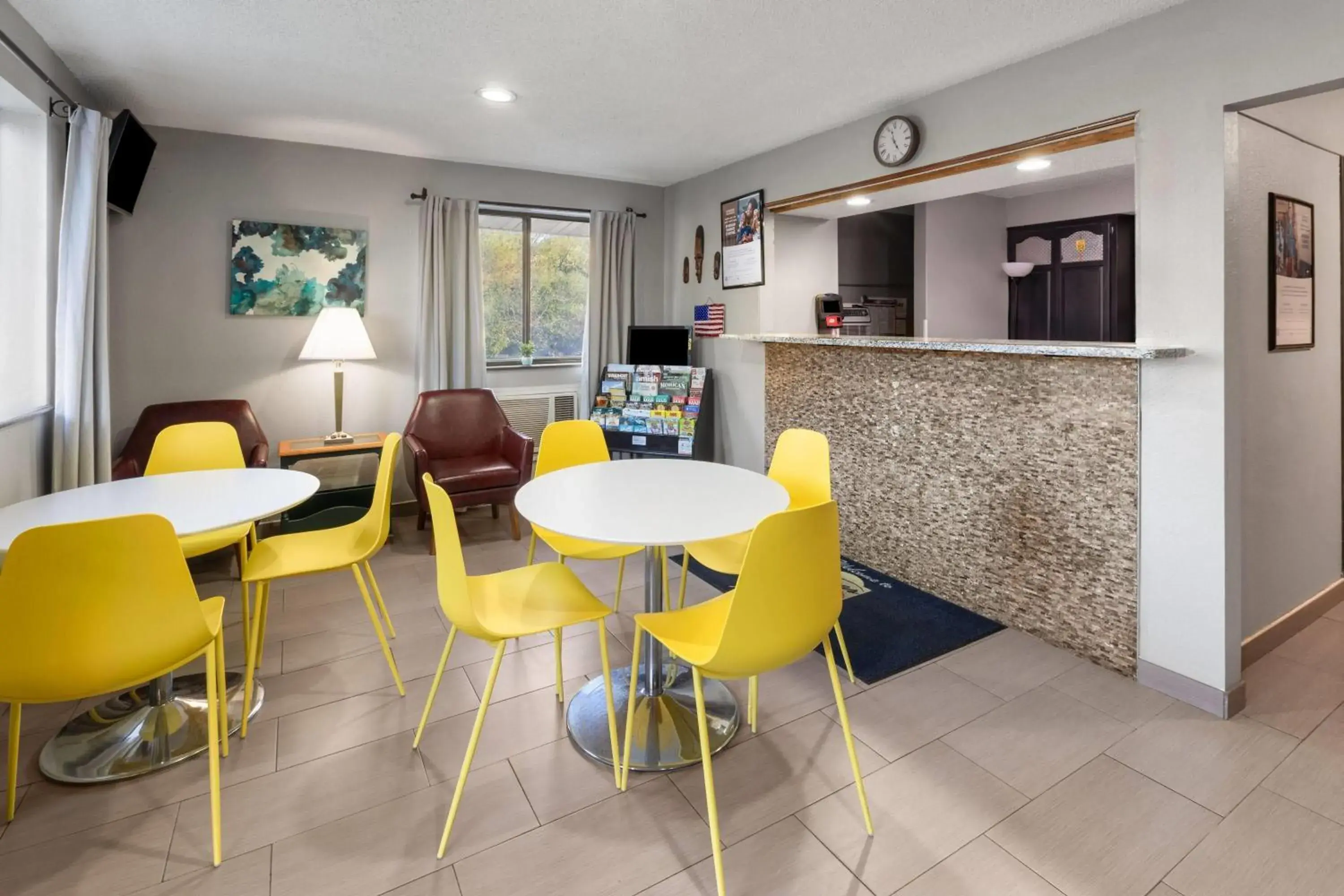 Lobby or reception in Super 8 by Wyndham Kent/Akron Area Lobby or reception in Super 8 by Wyndham Kent/Akron Area