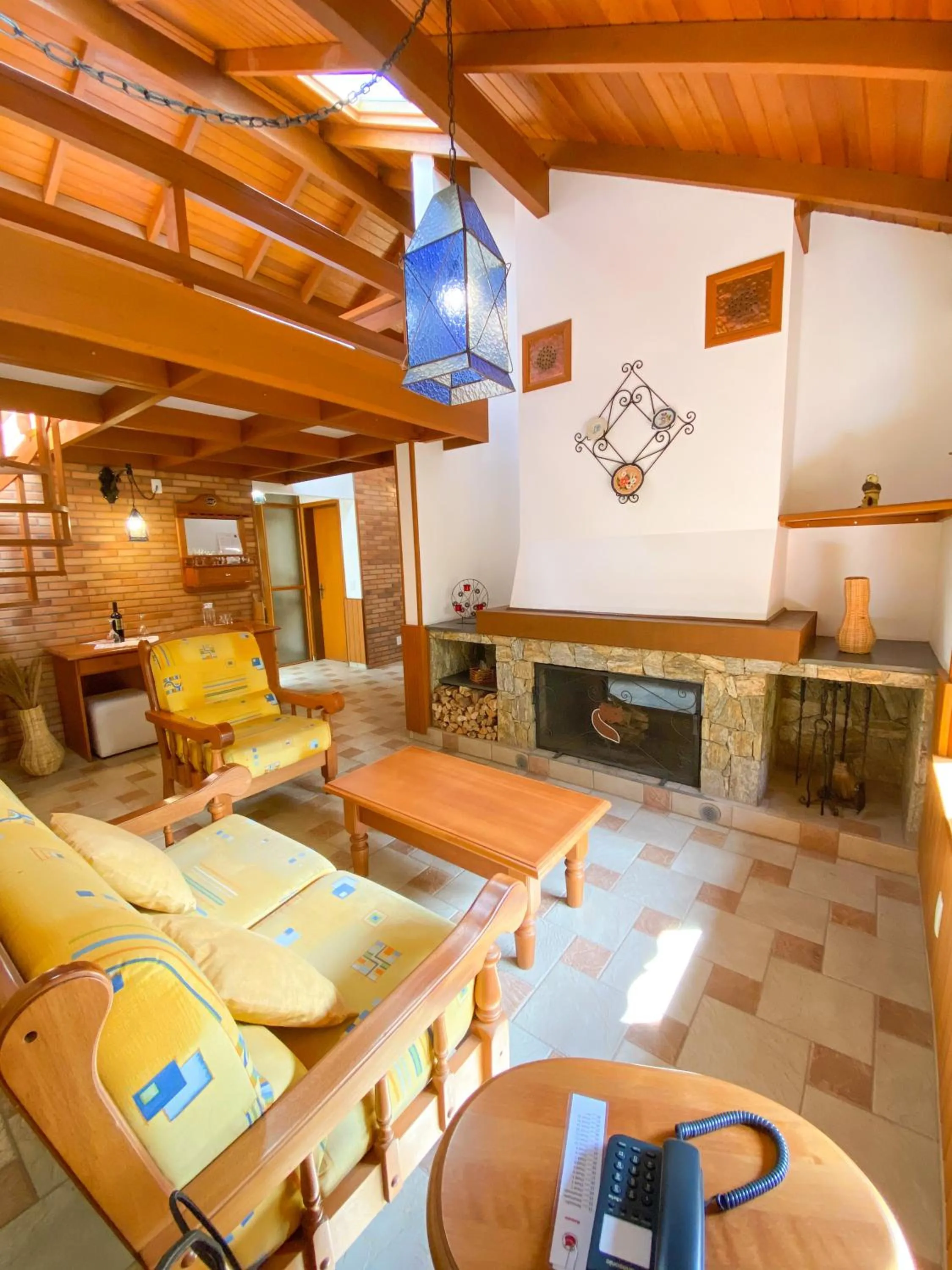 Seating area in Pousada O Cantinho da Raposa