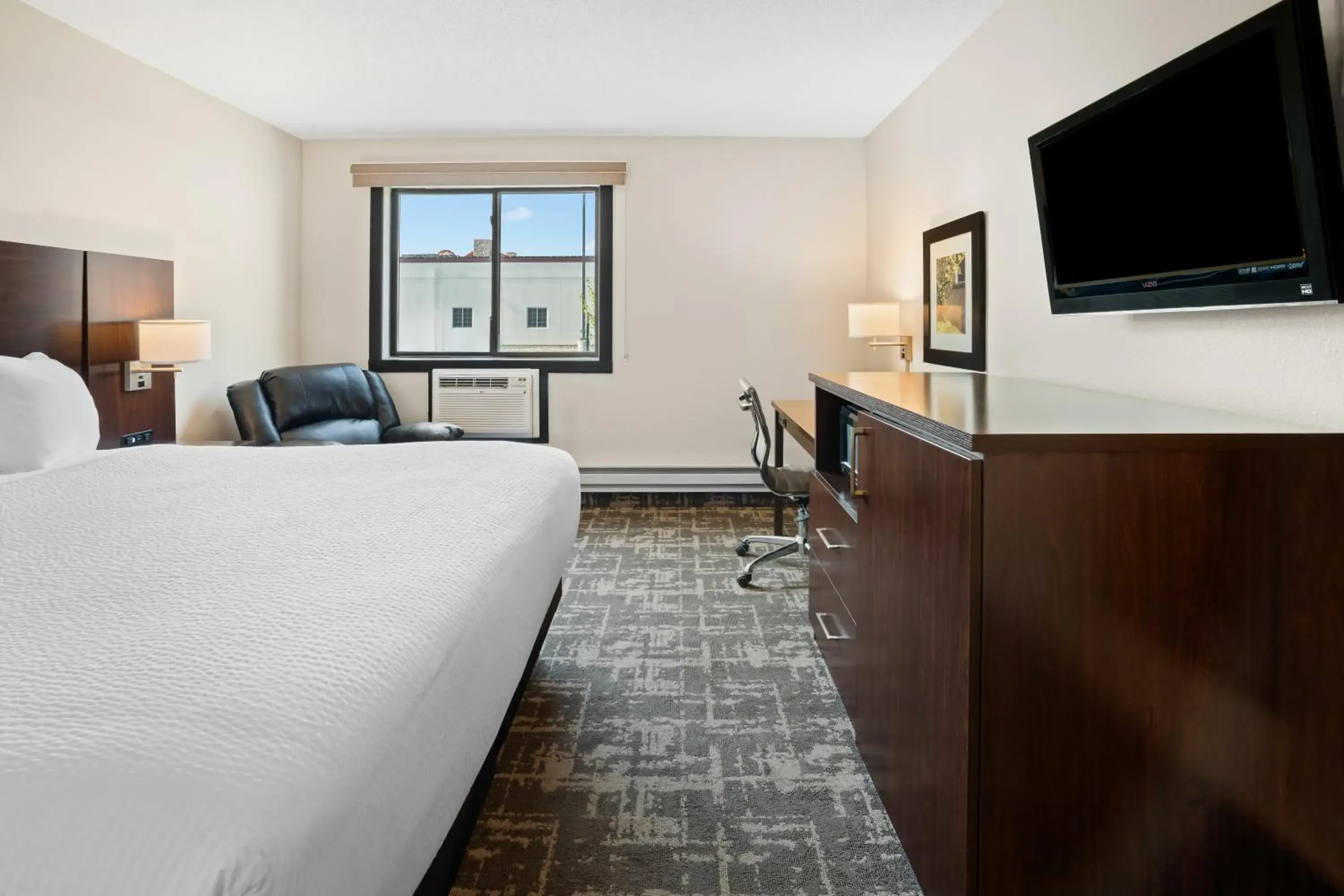 Photo of the whole room, Bed in Fargo Inn and Suites Photo of the whole room, Bed in Fargo Inn and Suites